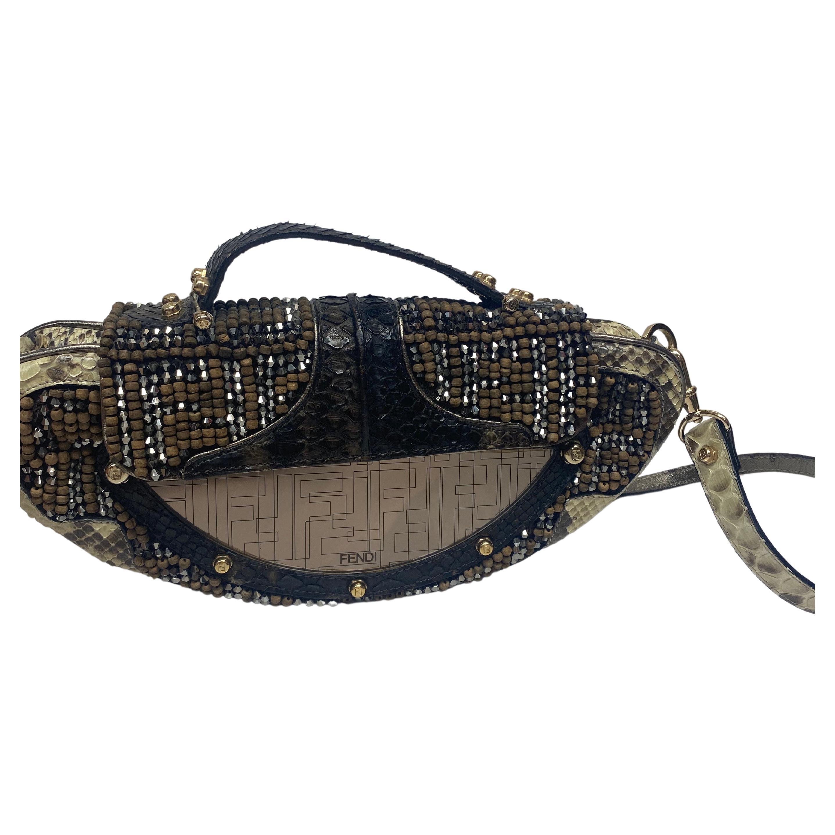 Fendi Vanity Etched Mirror with Crystal and Wood Beaded Python Clutch Handbag. - GHW. This beautiful eccentric bag from Fendi is a true collectors' piece. The bag is made two different tones of python, the interior is lined with an orange silk with