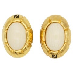 Fendi Vintage 1980s Asymmetric Fendista Logo FF Ivory Oval Chunky Clip Earrings