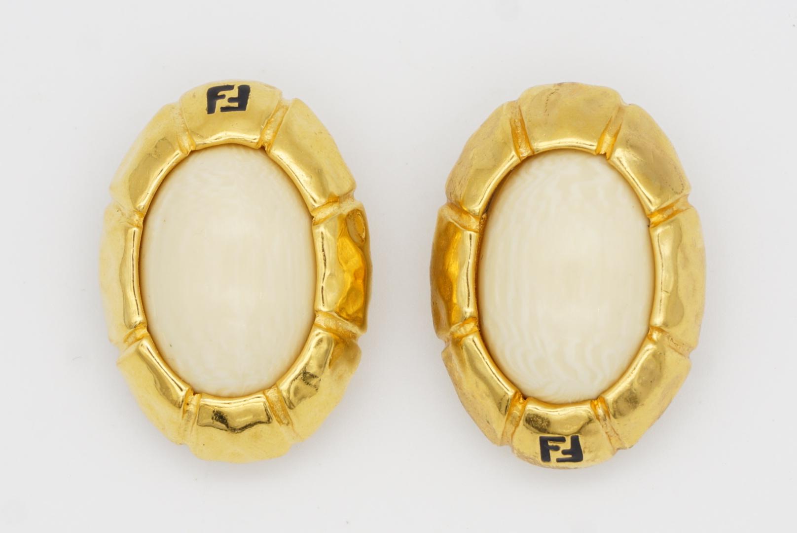Fendi Vintage 1980s Asymmetric Fendista Logo FF Ivory Oval Chunky Clip Earrings For Sale 3