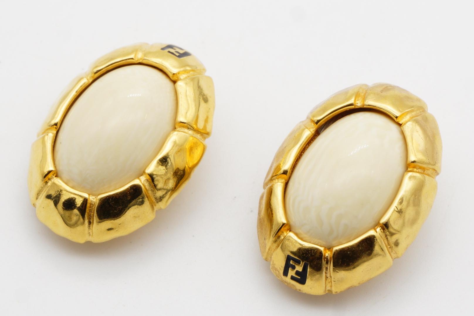 Fendi Vintage 1980s Asymmetric Fendista Logo FF Ivory Oval Chunky Clip Earrings For Sale 4
