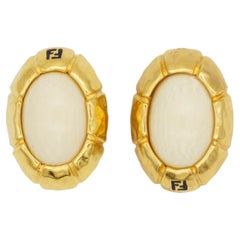 Fendi Vintage 1980s Asymmetric Fendista Logo FF Ivory Oval Chunky Clip Earrings