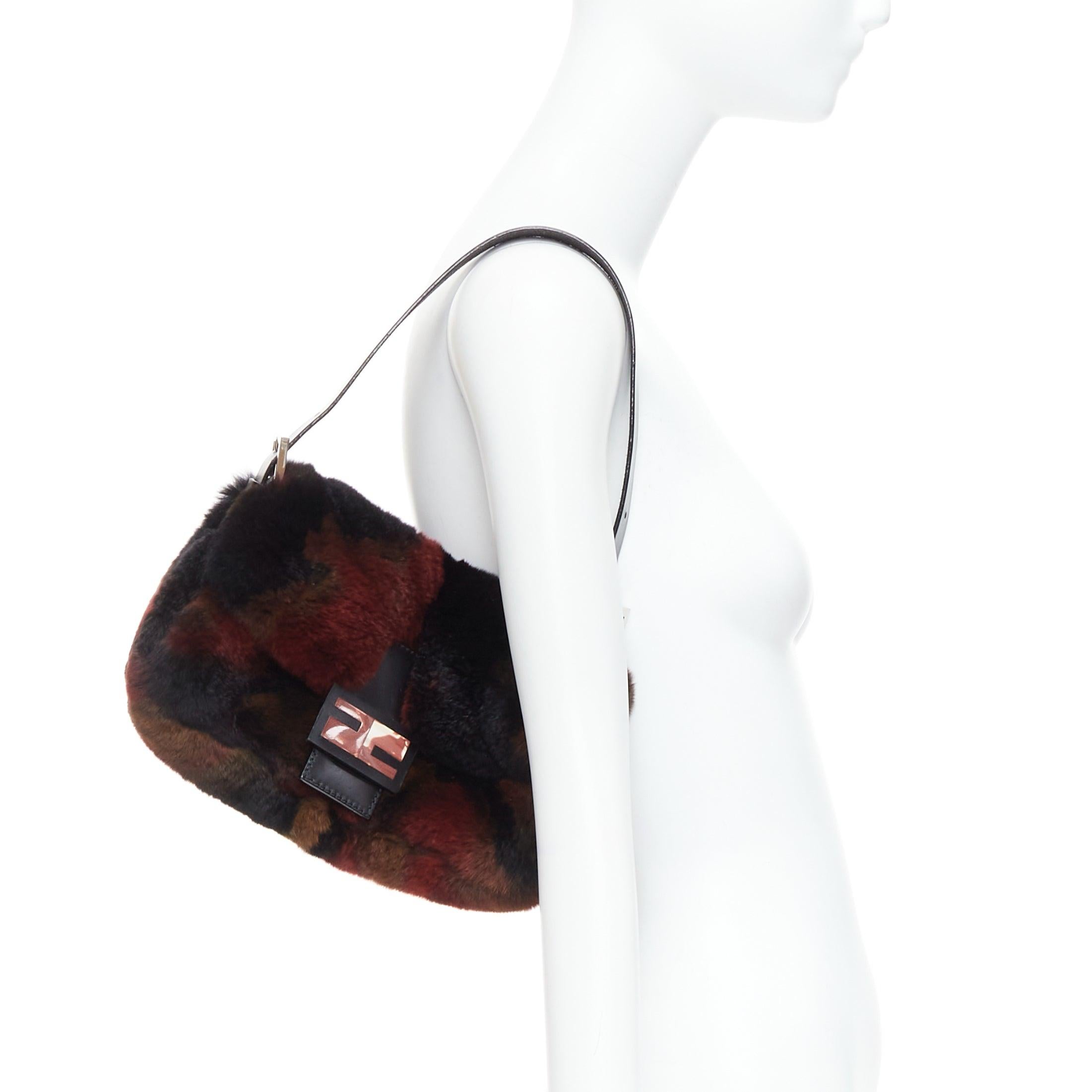 FENDI Vintage Baguette red tie dye rabbit fur FF logo underarm bag
Reference: TGAS/E00209
Brand: Fendi
Model: Baguette
Material: Fur, Leather
Color: Red, Black
Pattern: Animal Print
Closure: Magnet
Lining: Blue Leather
Extra Details: Blue leather