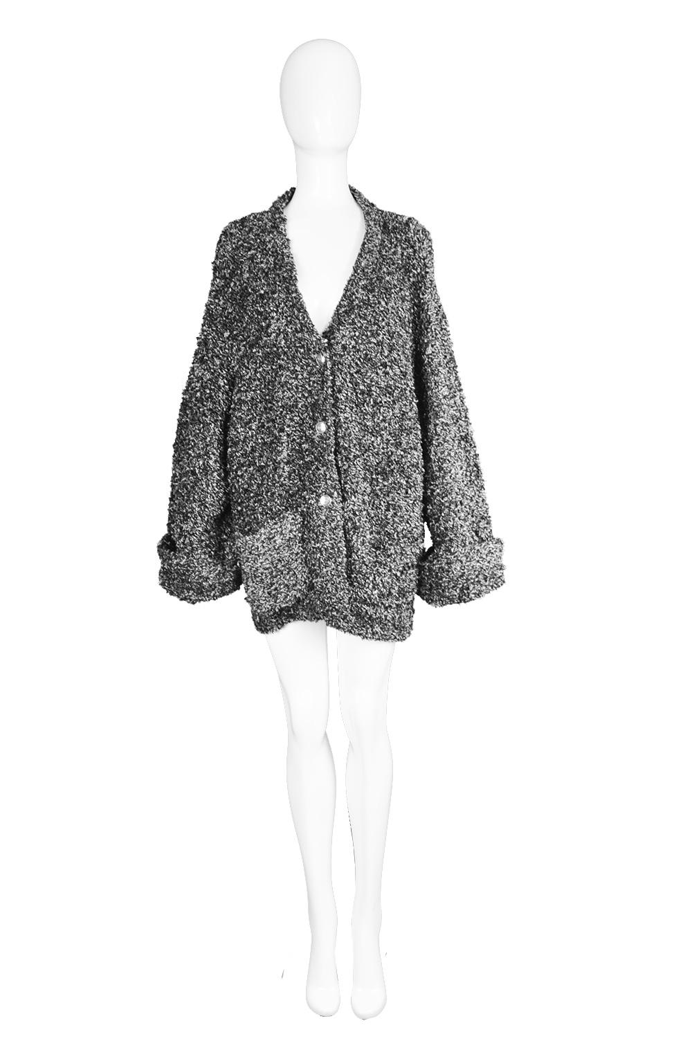 Fendi Vintage Black & White Fuzzy Slouchy Oversize Zucca Pattern Jacket, 1990s

Size: Unlabelled; best fits roughly a women's Medium to Large with an intentionally oversized fit. Please check measurements & description by clicking 'Continue Reading'