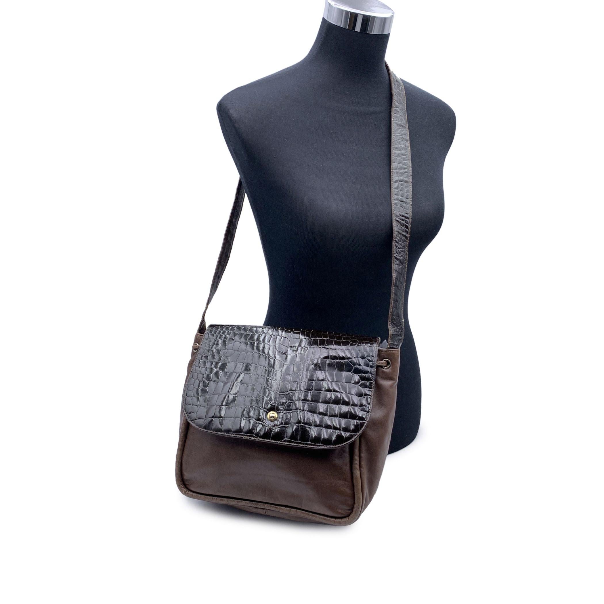 Embrace the timeless charm of a true vintage treasure with this Fendi Vintage Brown Leather Shoulder Bag. A perfect blend of classic sophistication and everyday practicality, this bag is crafted from rich brown leather with an embossed patent