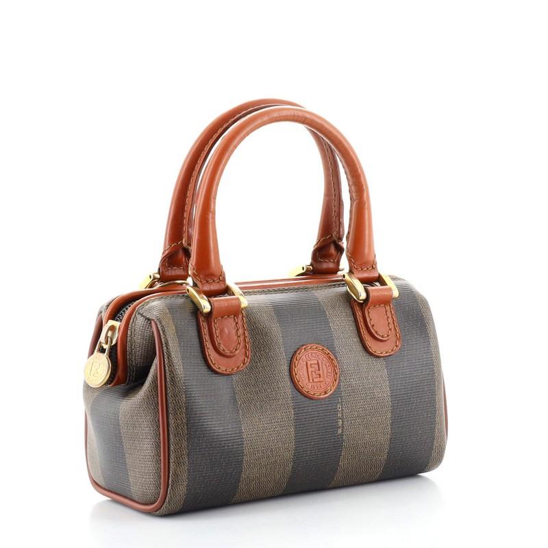 Condition: Very good. Odor in interior. Wear, scuffs and creasing on leather trims, handles and strap, peeling and indentations on handle wax edges. Wear, peeling and marks in interior, scratches and moderate discoloration on hardware.
Accessories: