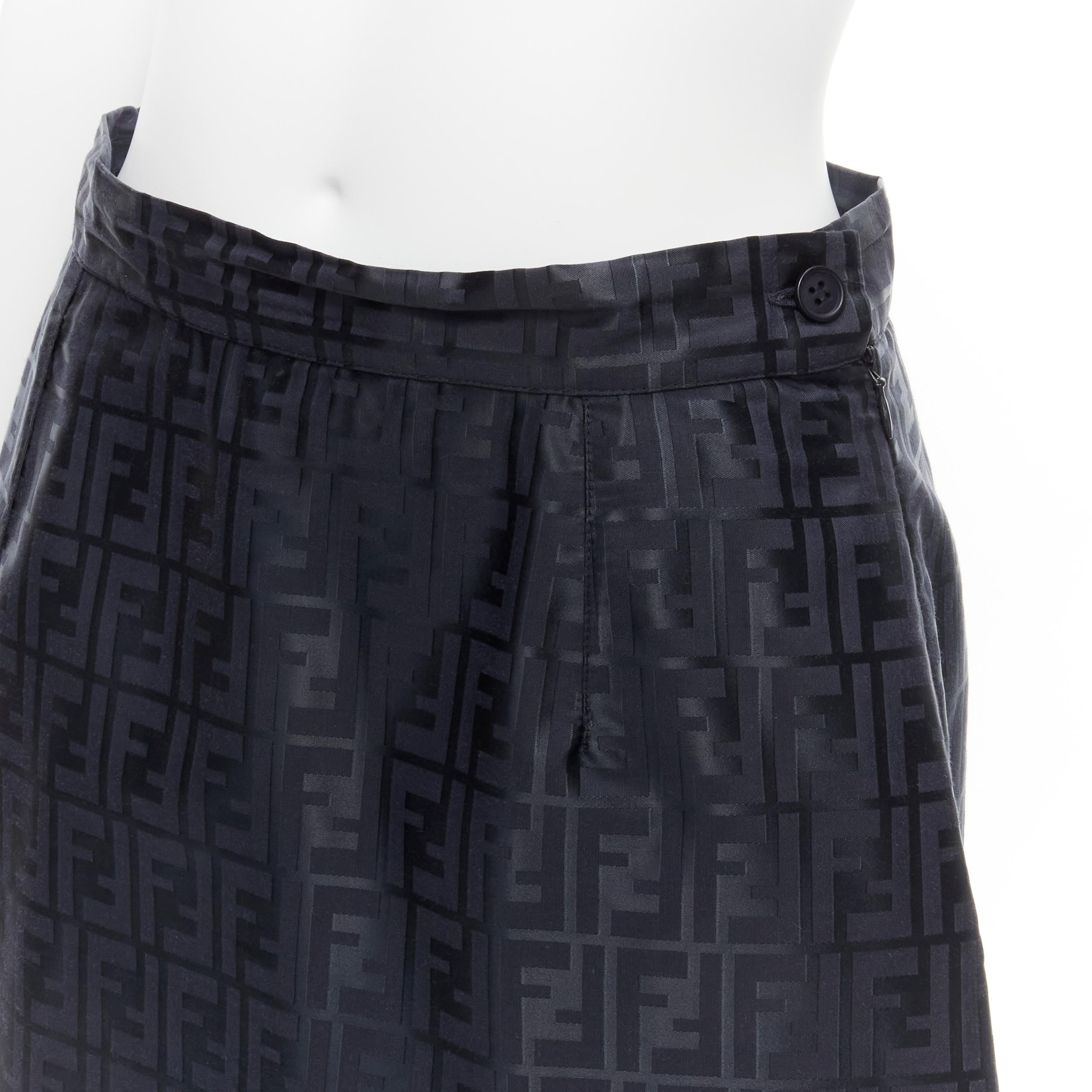 FENDI Vintage FF Zucca monogram navy high waist A-line skirt IT44 L
Reference: TGAS/C02007
Brand: Fendi
Material: Cotton, Nylon
Color: Black, Navy
Pattern: Monogram
Closure: Zip
Lining: Blue Fabric
Made in: Italy

CONDITION:
Condition: Excellent,