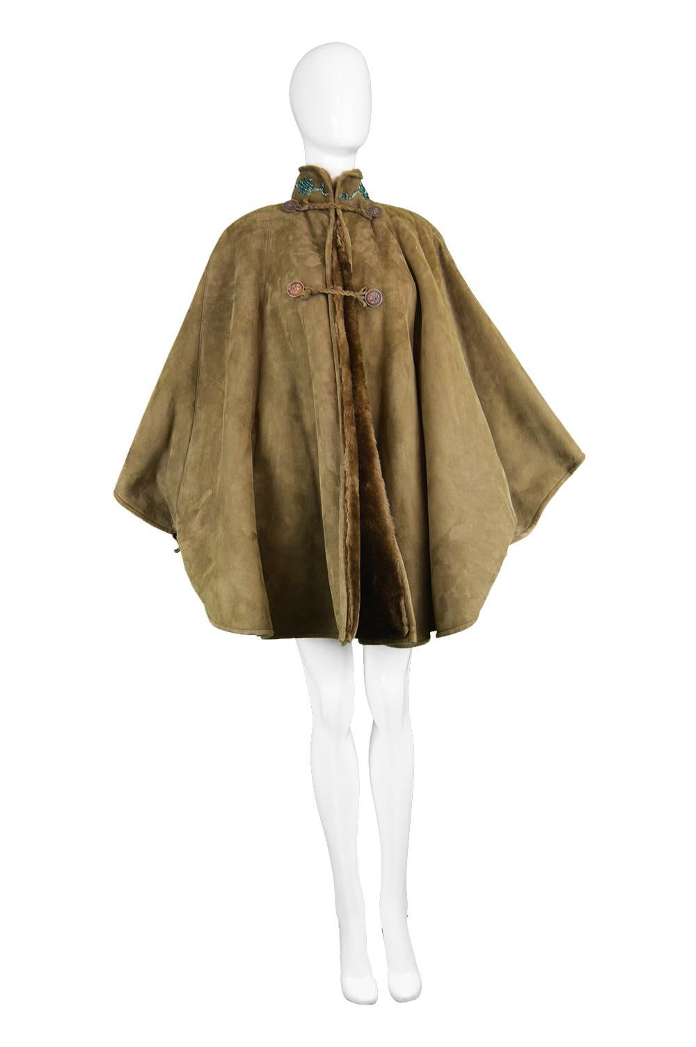 Fendi Embroidered Huge Brown Shearling Sheepskin Suede Cape Coat, 1980s

Size: One size fits all, meant to have a loose fit like all capes. Please see full description by clicking 'Continue Reading' below. 
Bust - Free
Waist - Free
Length (Shoulder
