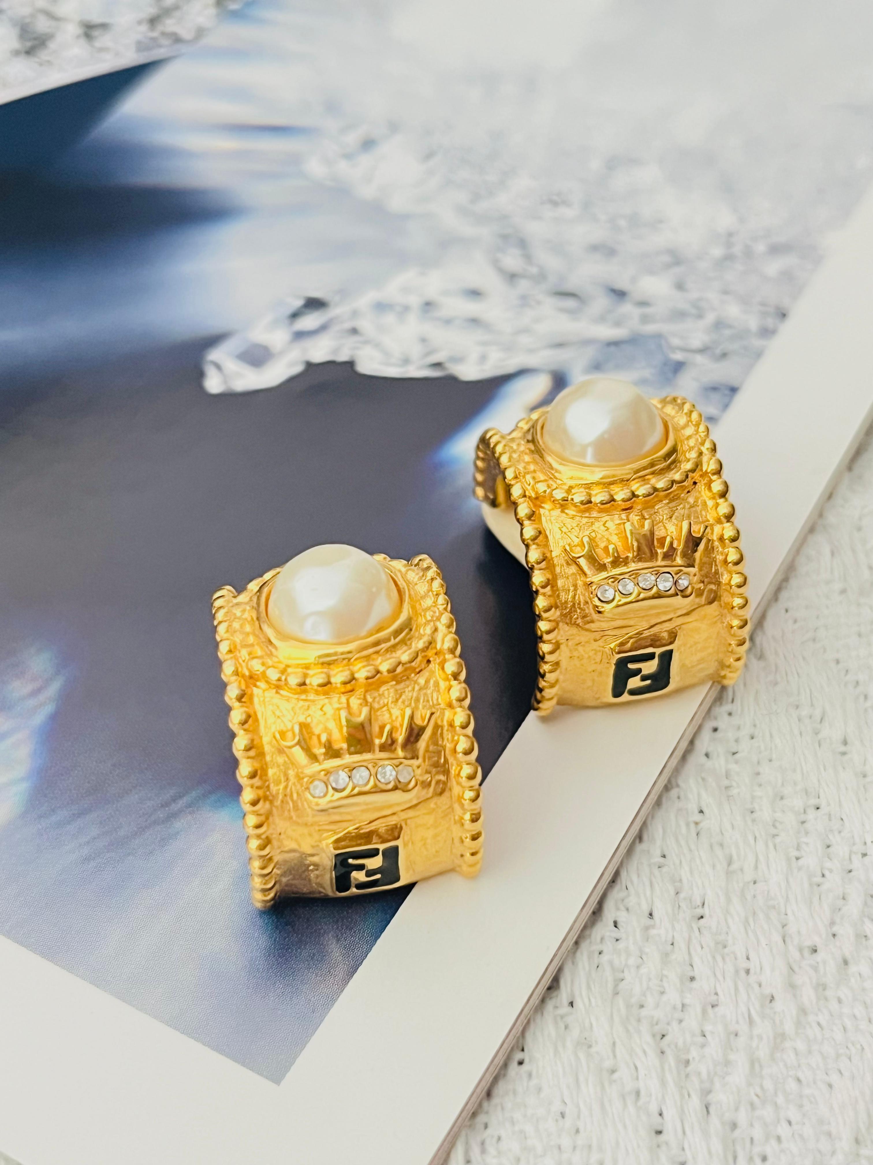 Fendi Vintage Baroque Relief Logo Black Enamel F Fendista Crown White Round Circle Pearl Crystals Dome Hoop Modernist Elegant Clip Earrings, Gold Plated

Very excellent condition. Looks very new. 100% genuine. Unique design.

A very beautiful pair