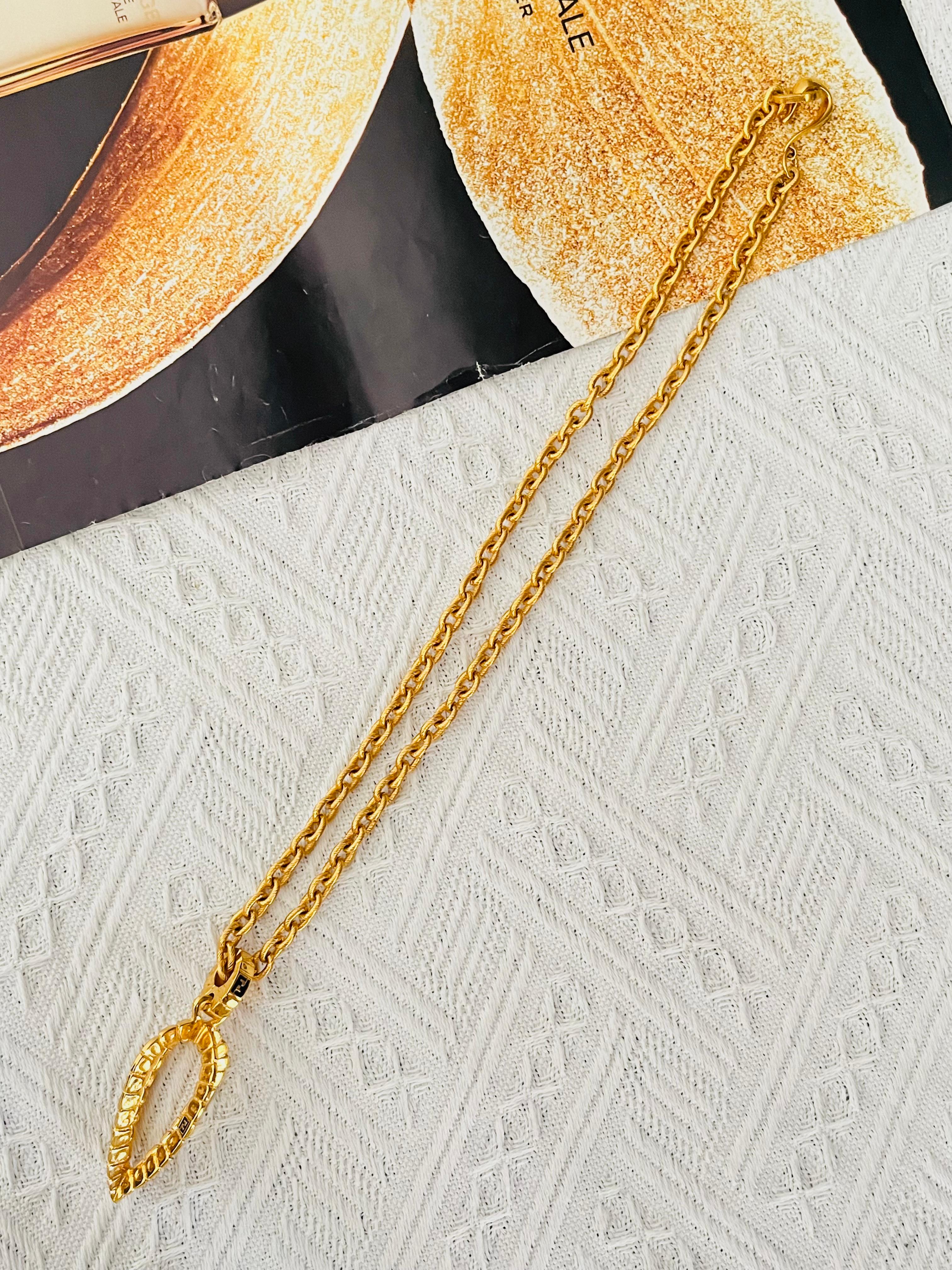 Fendi Vintage Unisex Large Logo F Fendista 3D Leaf Water Drop Openwork Pendant Chunky Statement Modernist Long Necklace Bracelet, Gold Plated

Very excellent condition. Very new. 100% Genuine.

A versatile necklace. Detachable. Can also be a