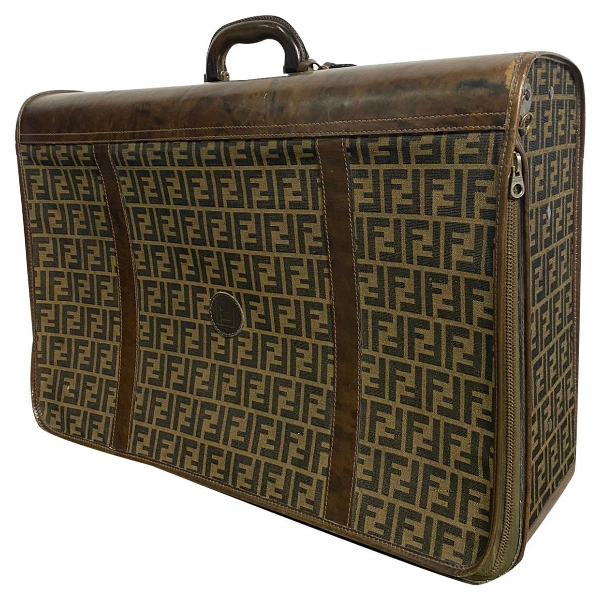 Fendi Vintage suitcase, in logoed canvas and leather parts. For Sale