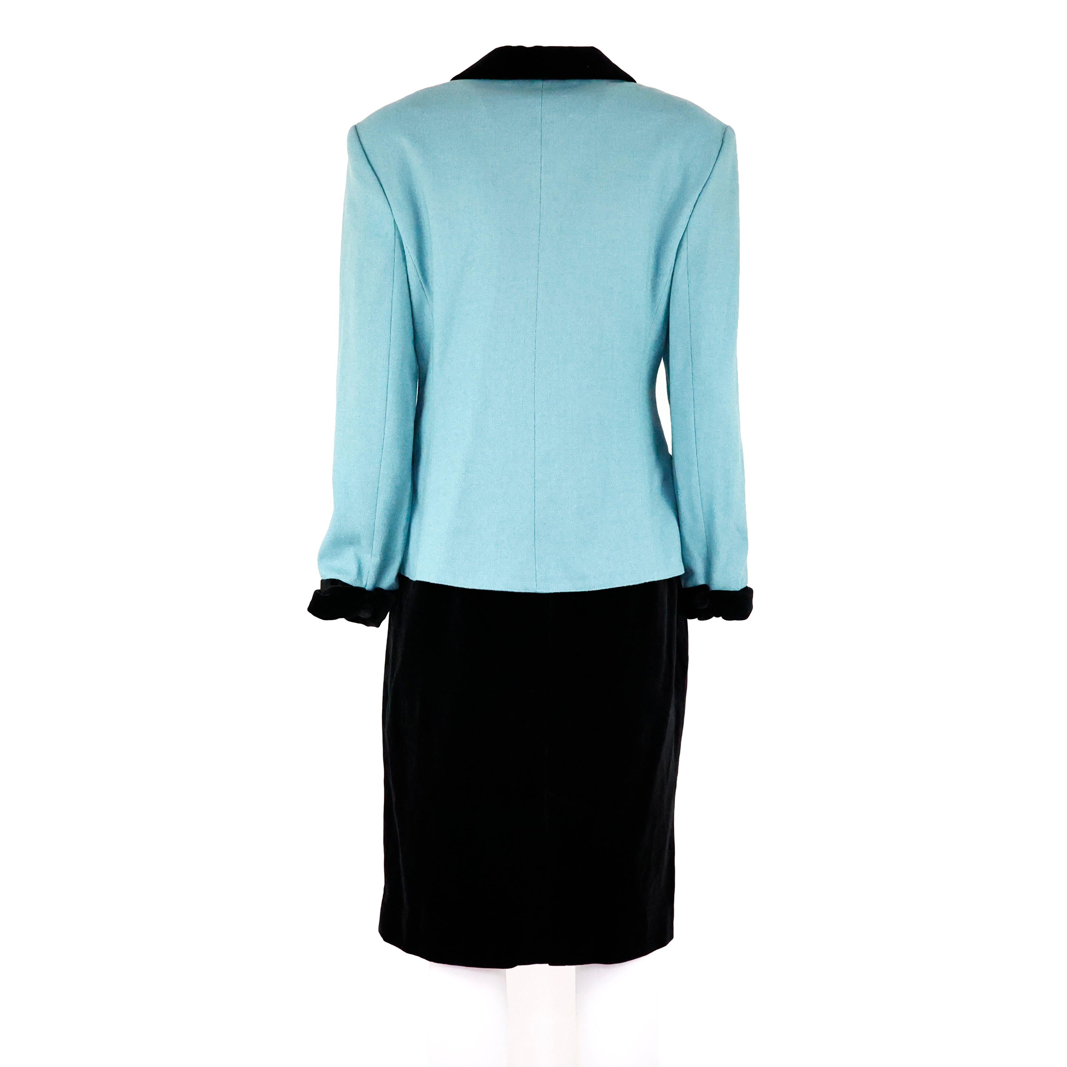 Ensemble tailleur Fendi veste et jupe en laine et velours coloris turquoise et noir. Taille 44 IT

Condit :
Vraiment bien.