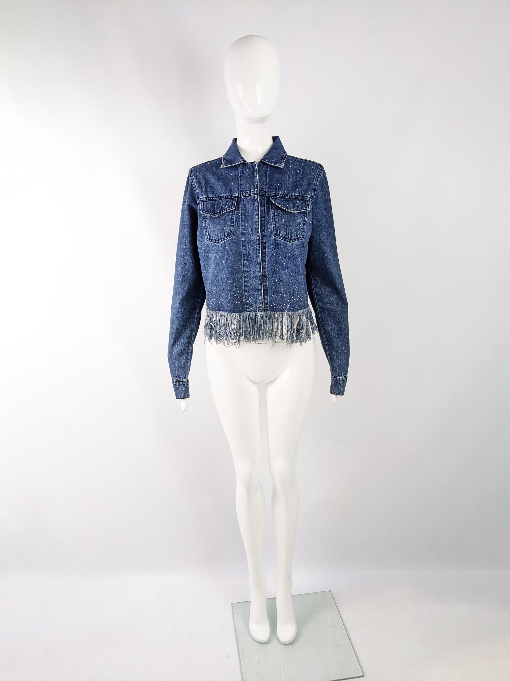 A fabulous and rare vintage Fendi womens denim jacket from the late 90s / early 2000s. Made in Italy from an indigo denim with fabulous crystals/ rhinestones beaded throughout and distressed fringing along the bottom for a glamorous y2k look.