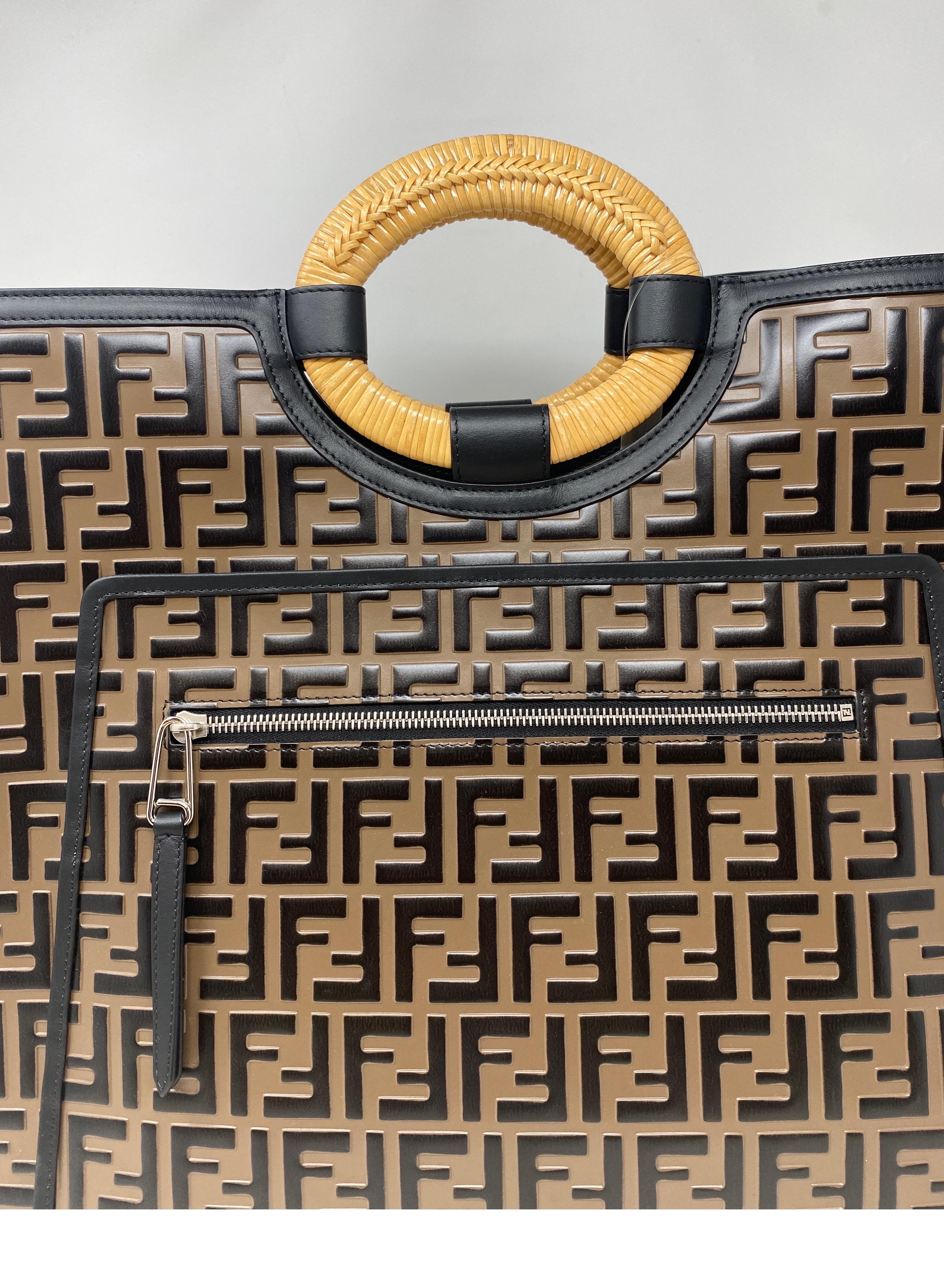 Fendi Vitello FF 1974 Large Embossed Runaway Shopper Bag. Great size tote bag. Embossed Fendi leather bag. New with tags. Never worn. Beautiful bag with woven handle. Guaranteed authentic. 