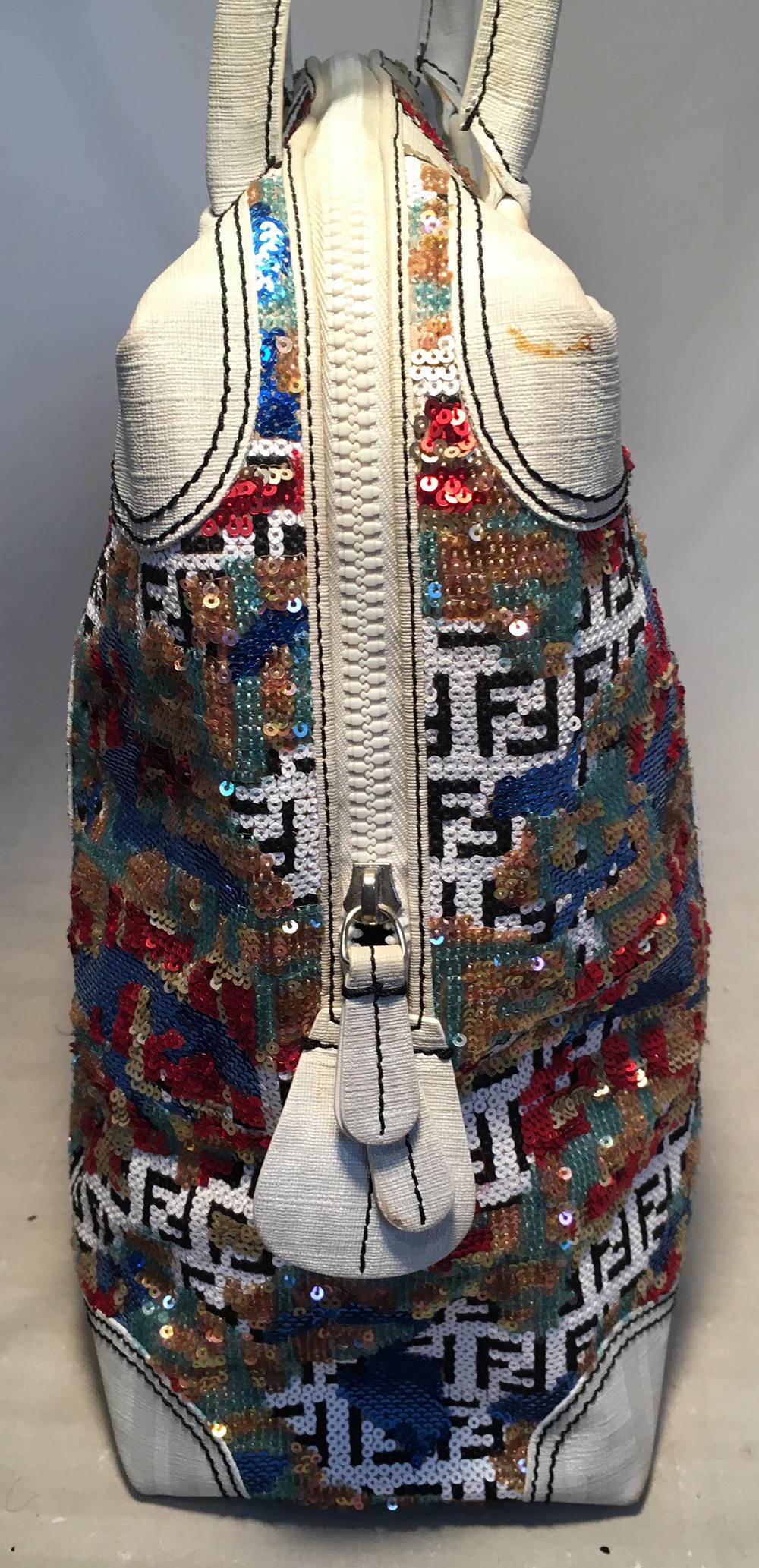 Fendi White Canvas and Multicolor Sequin Tote Bag in very good condition. White coated canvas  with signature Fendi monogram print in white. Body in black and white fendi monogram sequin pattern with multicolor sequin splashes of color throughout.