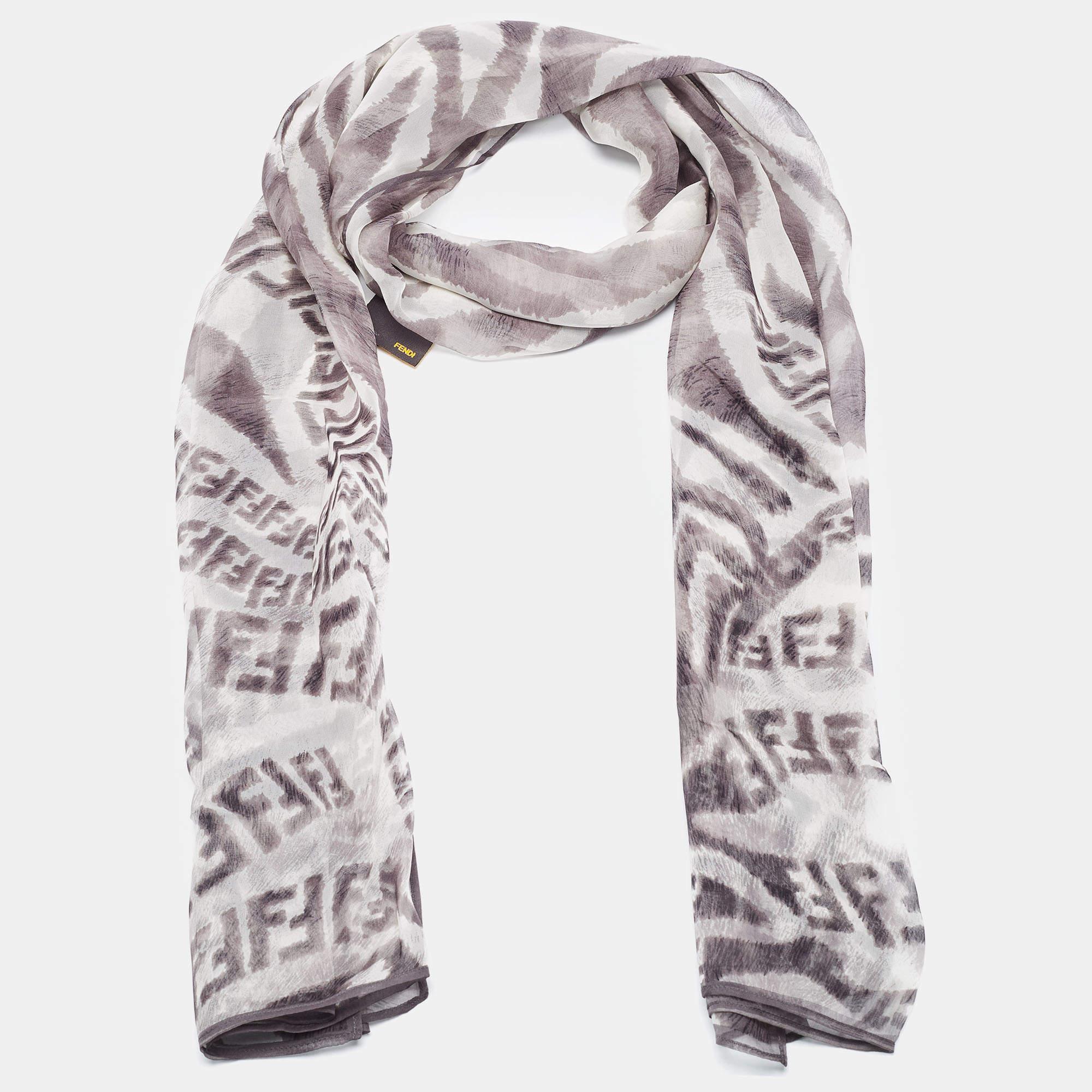 Whether it is over an evening outfit or chic casuals, Fendi ensures an extra element of style with this gorgeous scarf. Made of silk, the creation's appeal is brought out with prints all over.

