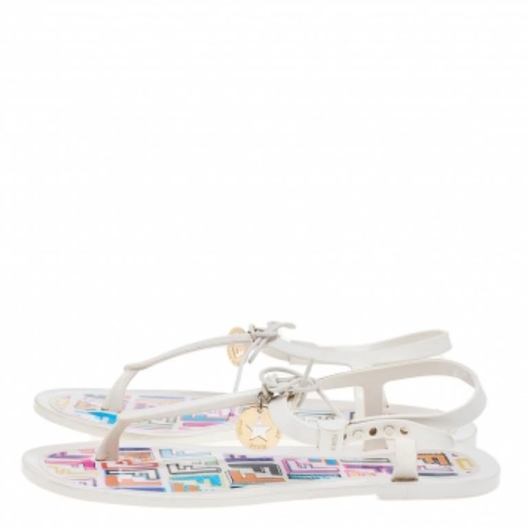 These Sunny sandals from the house of Fendi are youthful and stylish! They have been crafted from jelly, which makes them water-friendly whilst providing comfort to your feet. The pair carries a thong design and is accented with logo charm and bows
