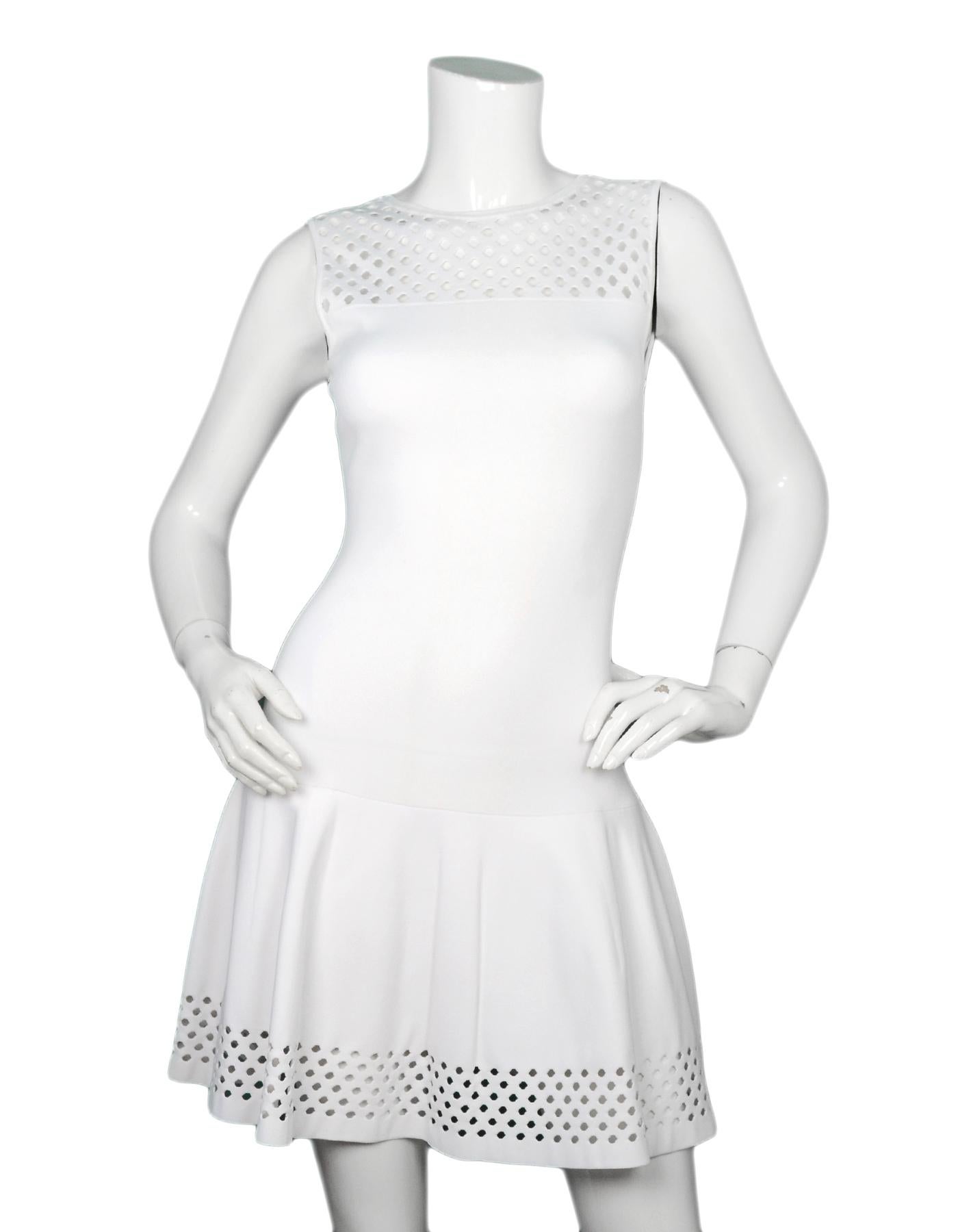 Fendi White Knit Cutout Mini Dress Sz IT36/US0

Made In: Italy
Color: White
Materials: 84% rayon 17% polyester 
Opening/Closure: Hidden back zipper with hook eye at top
Overall Condition: Excellent pre-owned condition 
Estimated Retail: $1,200 +