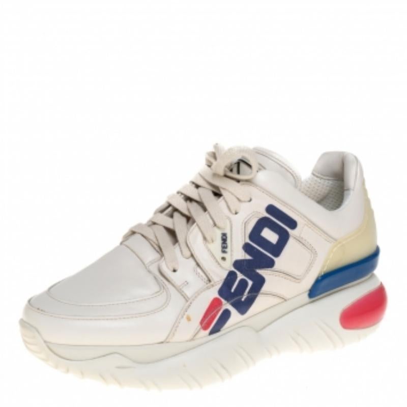 These sneakers are from the collaboration between Fendi and Fila. Made from leather and rubber, they feature durable soles and lace-up vamps. Fila's signature red and blue as well as other elements are seamlessly incorporated into the Fendi pair.