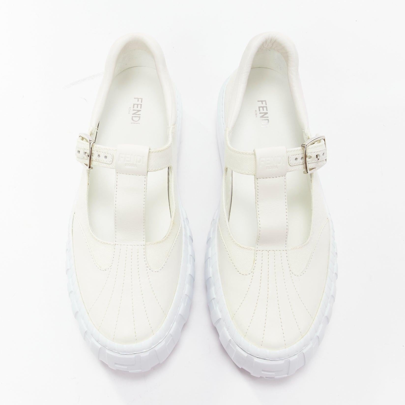 FENDI white leather canvas logo buckles t strap platform sneakers EU41
Reference: CNLE/A00265
Brand: Fendi
Material: Leather, Canvas
Color: White, Silver
Pattern: Solid
Closure: Buckle
Lining: White Leather
Extra Details: FF logo detail at