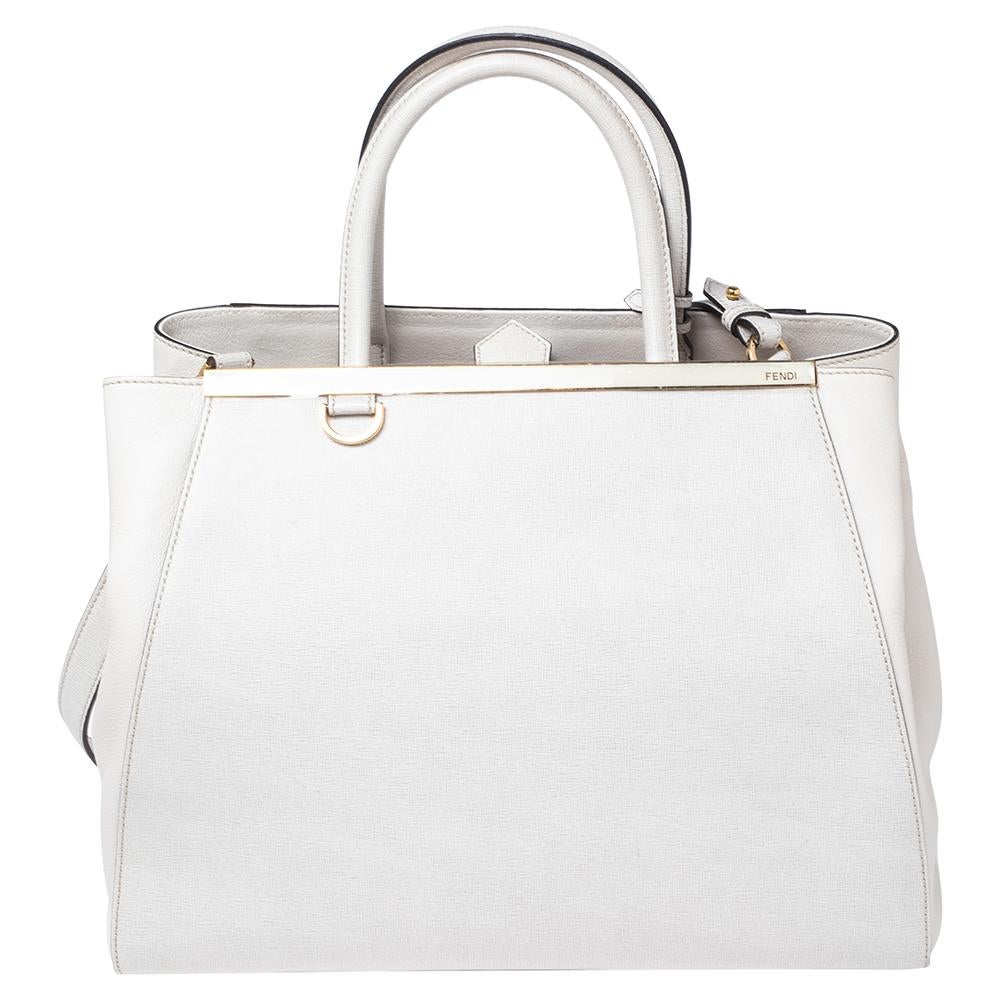 One of the most iconic designs from Fendi, the 2Jours tote continues to receive the love of women around the world. Crafted from white leather, the bag features double-rolled handles. It is also equipped with a fabric interior and finished with