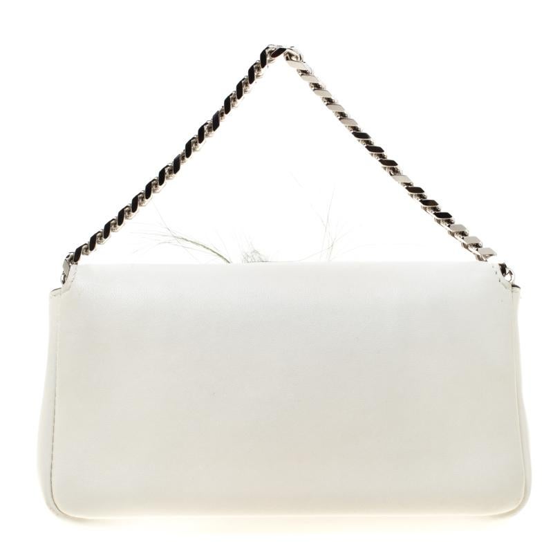 Carry this Fendi Micro Monster baguette and garner admirable glances as you march along. The bag is crafted in white leather embellished with crystals. It features a silver-tone link chain and FF hardware logo. To create an exclusive Fendi monster