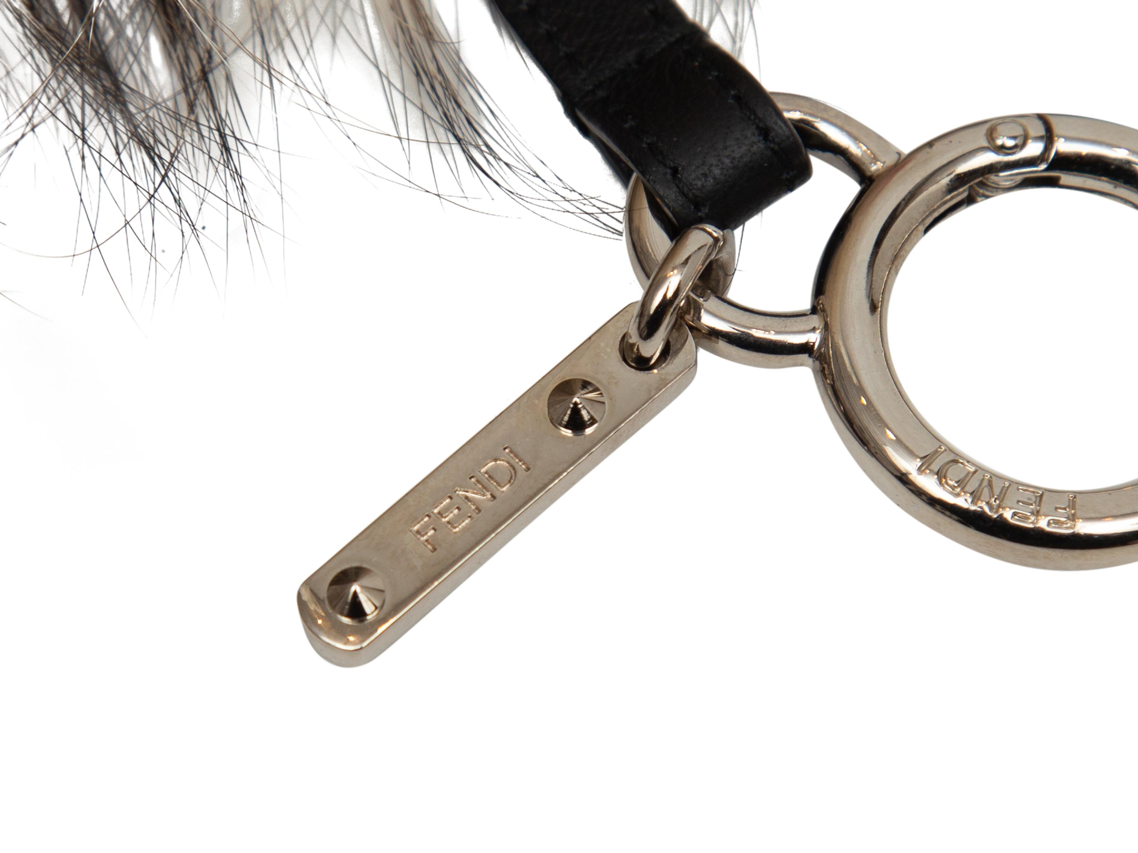 Product details: White and multicolor fox fur Monster Bag Bug charm by Fendi. Silver-tone hardware. 7