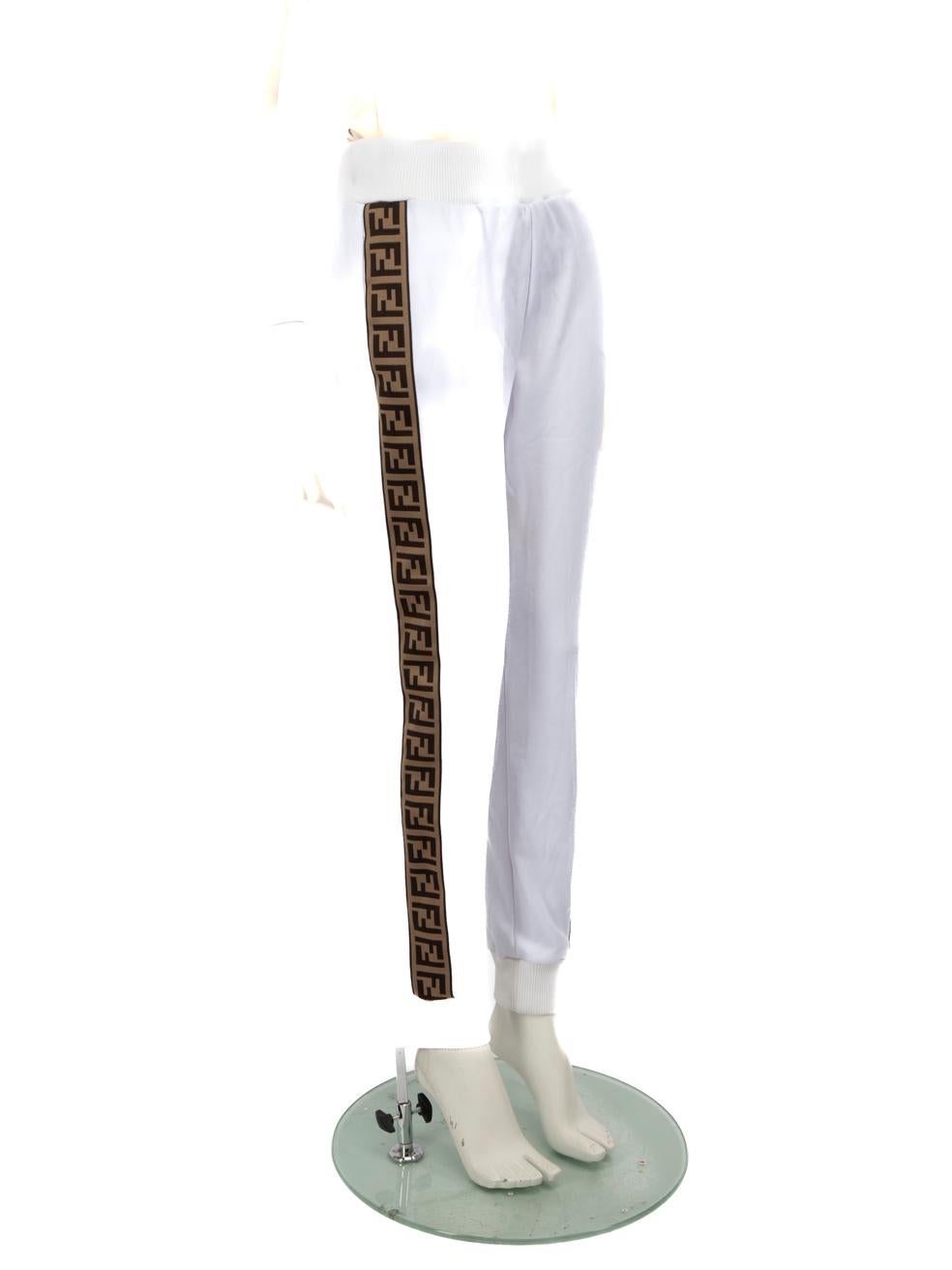 CONDITION is Good. Minor wear to the joggers is evident, there is discolouration on the waistband and a mark on the front left leg. Discolouration may need gentle hand wash contrary to dry clean instructions.
 
 
 
 Details
 
 
 White
 
 Polyester
