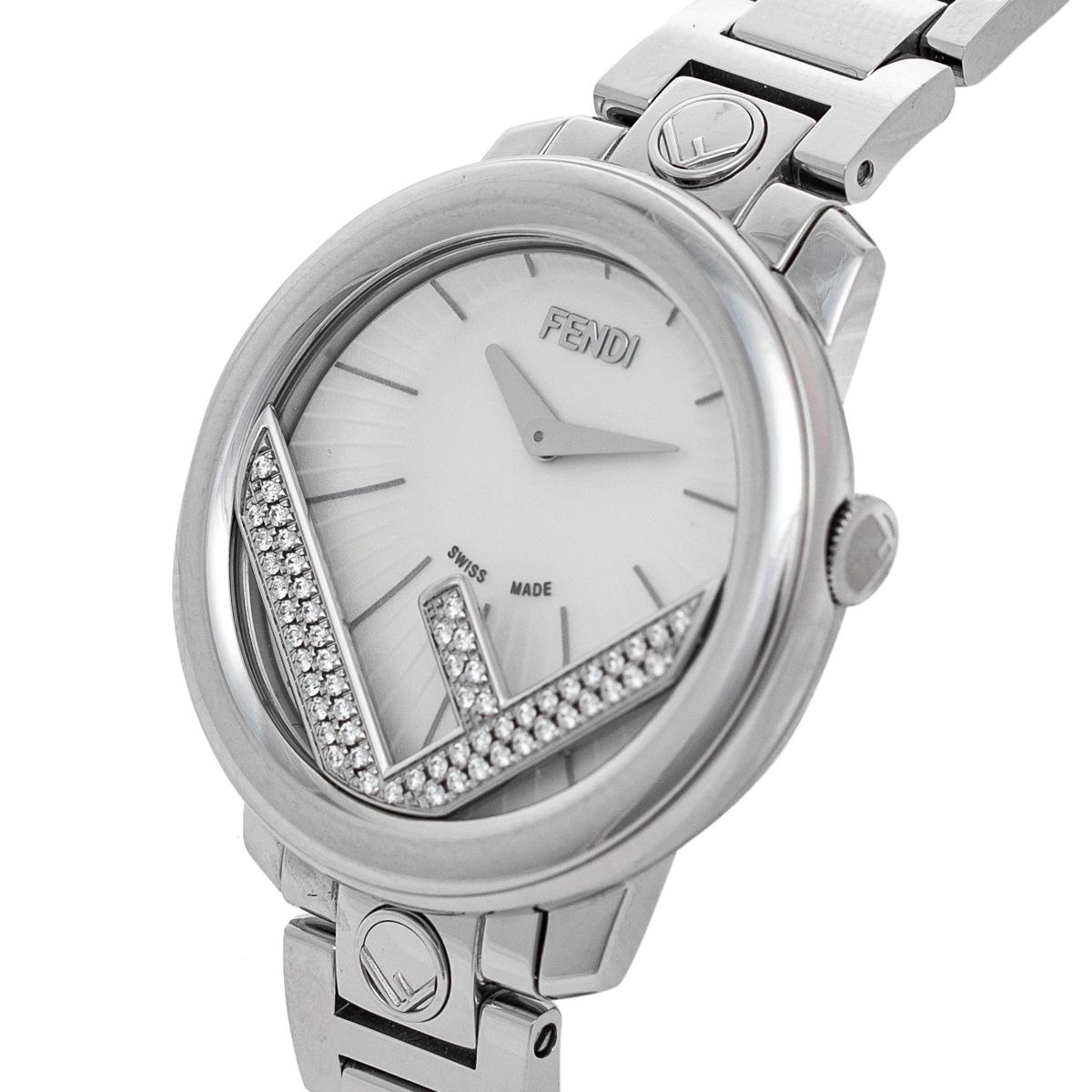 Watches from Fendi know how to steal the spotlight and adorn your wrist with utmost sophistication and style! This Runaway timepiece exhibits a stainless steel case that has a diameter of 28 mm and a white dial that flaunts the signature inverted