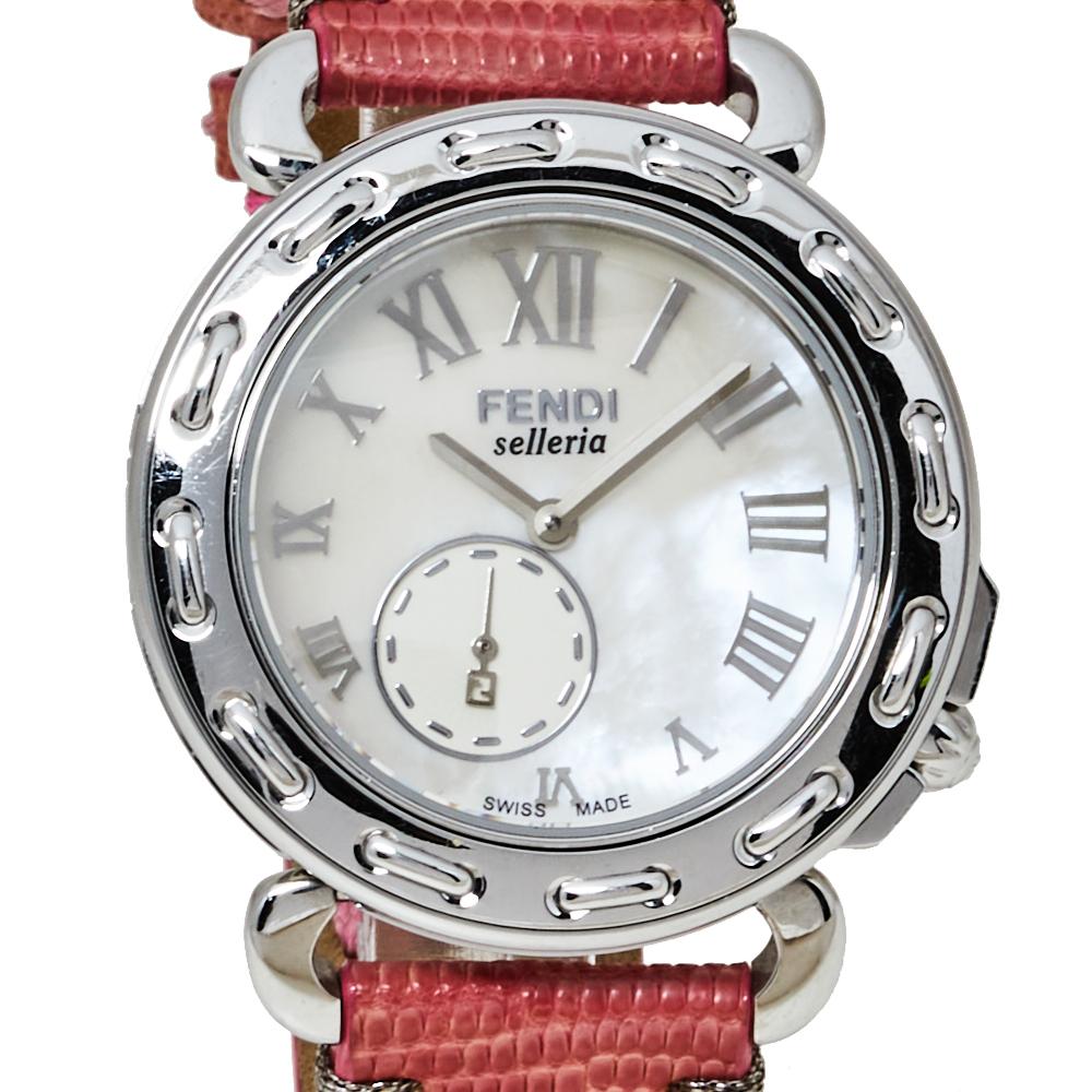 This Fendi Swiss-made watch is crafted from stainless steel and it carries the brand's signature Selleria touch, which is a pattern of a running stitch. The watch has a white dial with two hands, Roman numerals, and a subdial. It follows a quartz