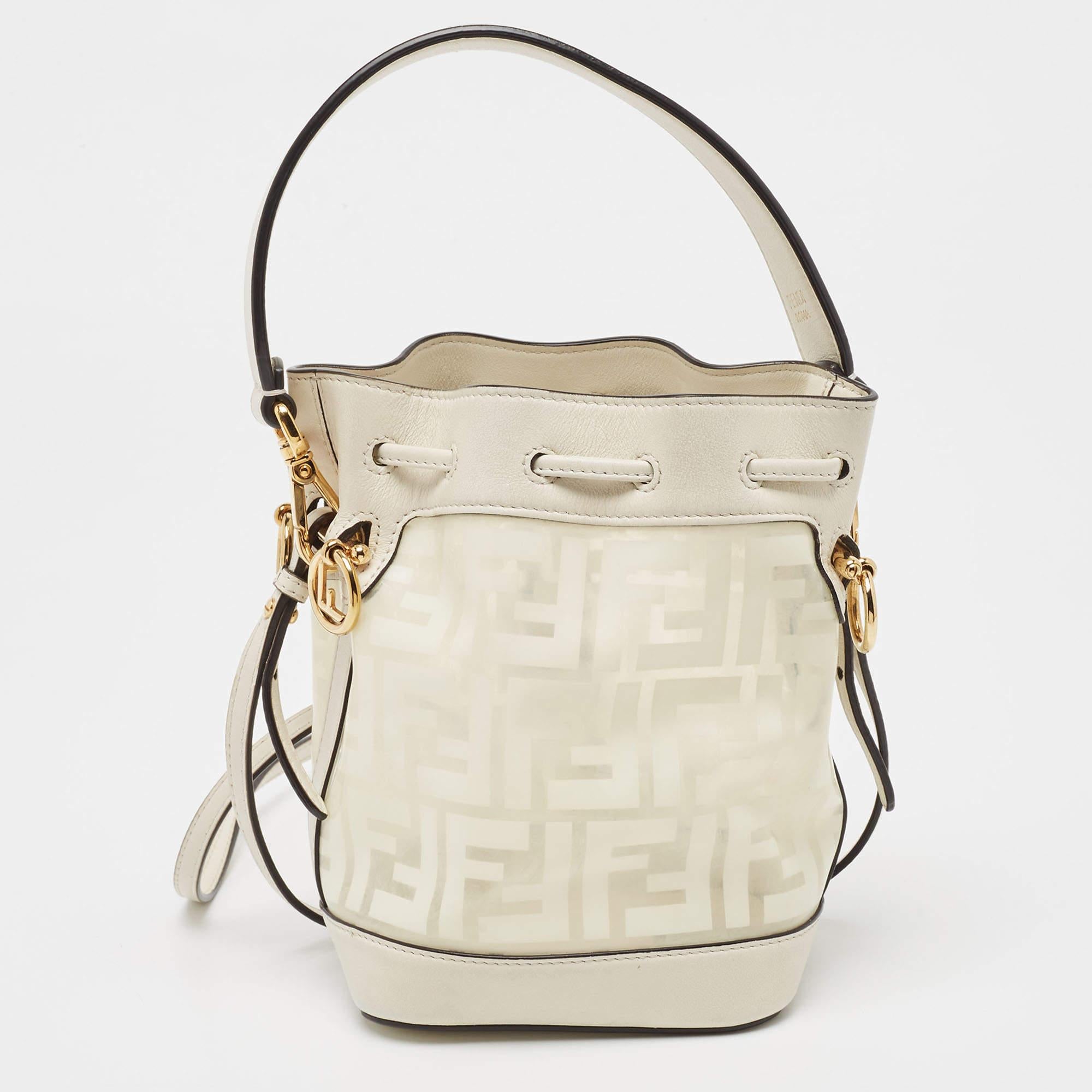 This wonderful Fendi design is made from FF leather and enhanced with gold-tone hardware. The bag has a bucket shape with a drawstring closure that secures the well-sized interior. Complete with a top handle and a shoulder strap, it is an apt