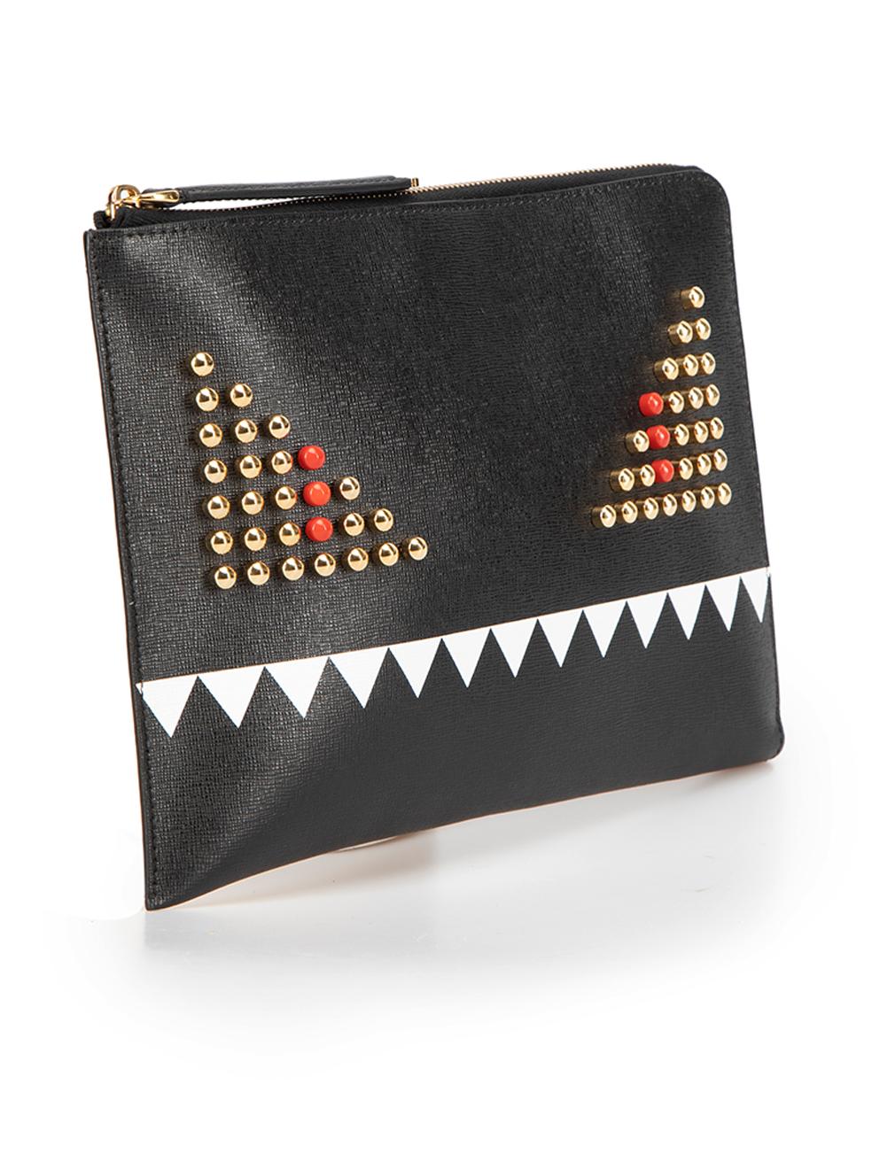 CONDITION is Very good. Minimal wear to clutch is evident. Minimal wear to the front with tiny scratch to the leather on this used Fendi designer resale item. This item comes with original dust bag and box.



Details


Black

Leather

Mini clutch