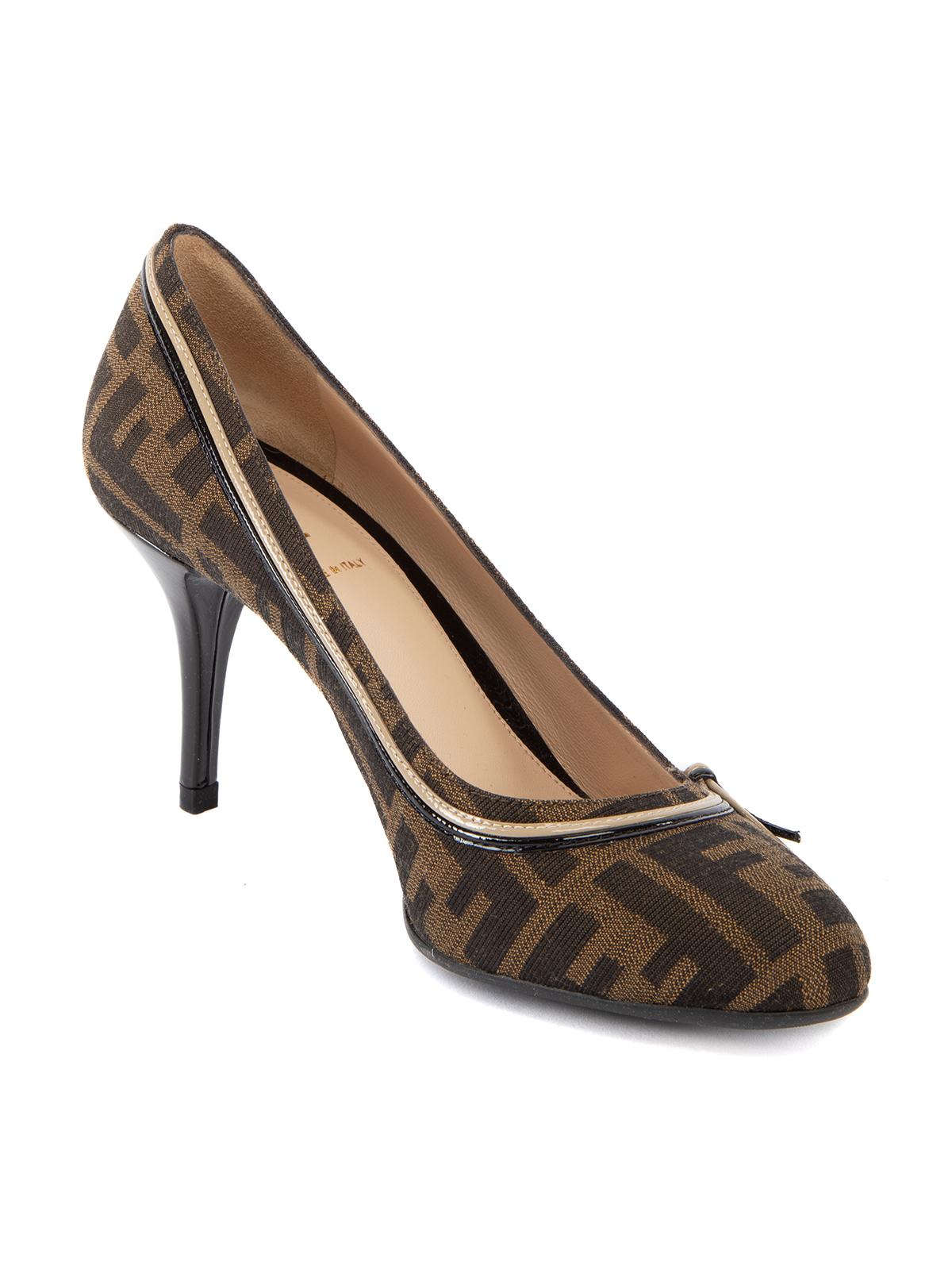 CONDITION is Never Worn. No visible wear to heels is evident on this used Fendi designer resale item. Details Black, brown Court shoe Mid heel Patent leather piping Comes with box Made in Italy Composition Cloth, leather Size & Fit Heel Height