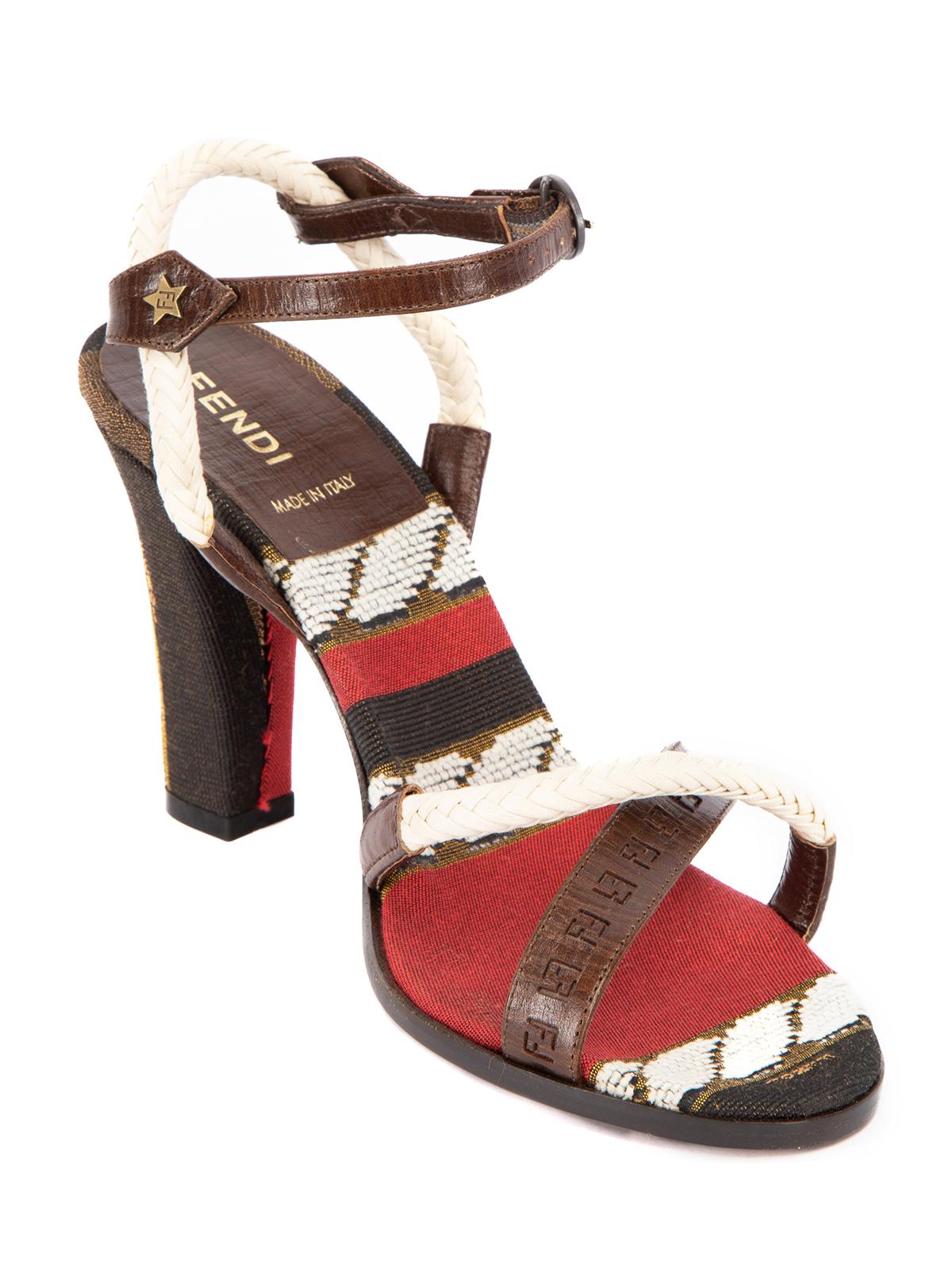 CONDITION is Very Good. Hardly any wear to sandal is evident. The leather insole patch on the right foot has come undone on this used Fendi designer resale item.   Details  Multicoloured Leather and canvas  Open toe  Strap details  High heel  Logo