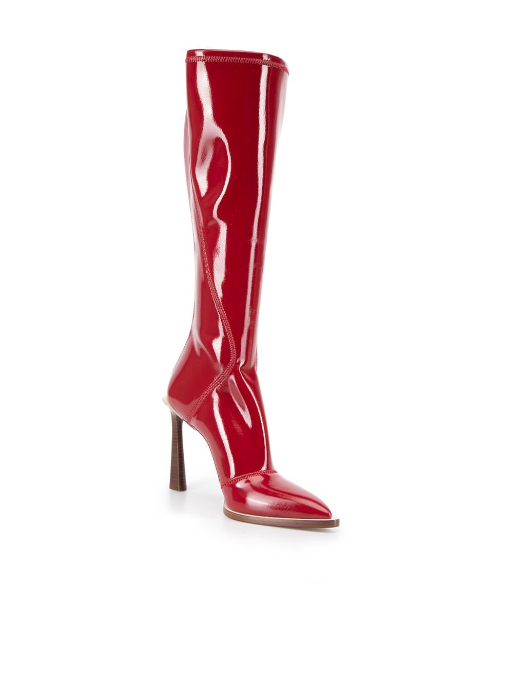 CONDITION is Very good. Hardly any visible wear to boots is evident. The boot do have some creasing and folding due to storage on this used Fendi designer resale item.



Details


Red

Patent leather

Knee high boots

Pointed toe

Accent