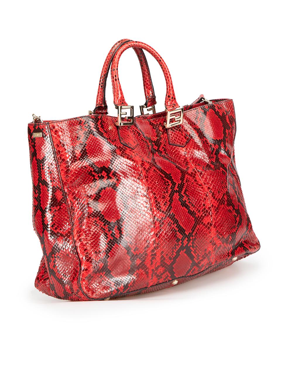 CONDITION is Very good. Minimal wear to bag is evident. Minimal wear to the hardware with faint scuff marks and tarnishing to the internal clasp on this used Fendi designer resale item.



Details


Red

Snakeskin leather

Large handbag

Gold tone