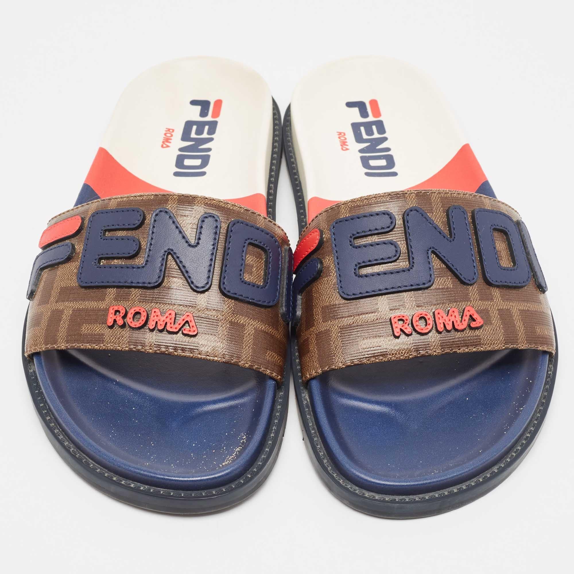 These flats are from the collaboration between Fendi and Fila. They feature FF logo canvas straps and durable rubber soles. Fila's signature red and blue as well as other elements are seamlessly incorporated into the Fendi pair.

Includes: Original