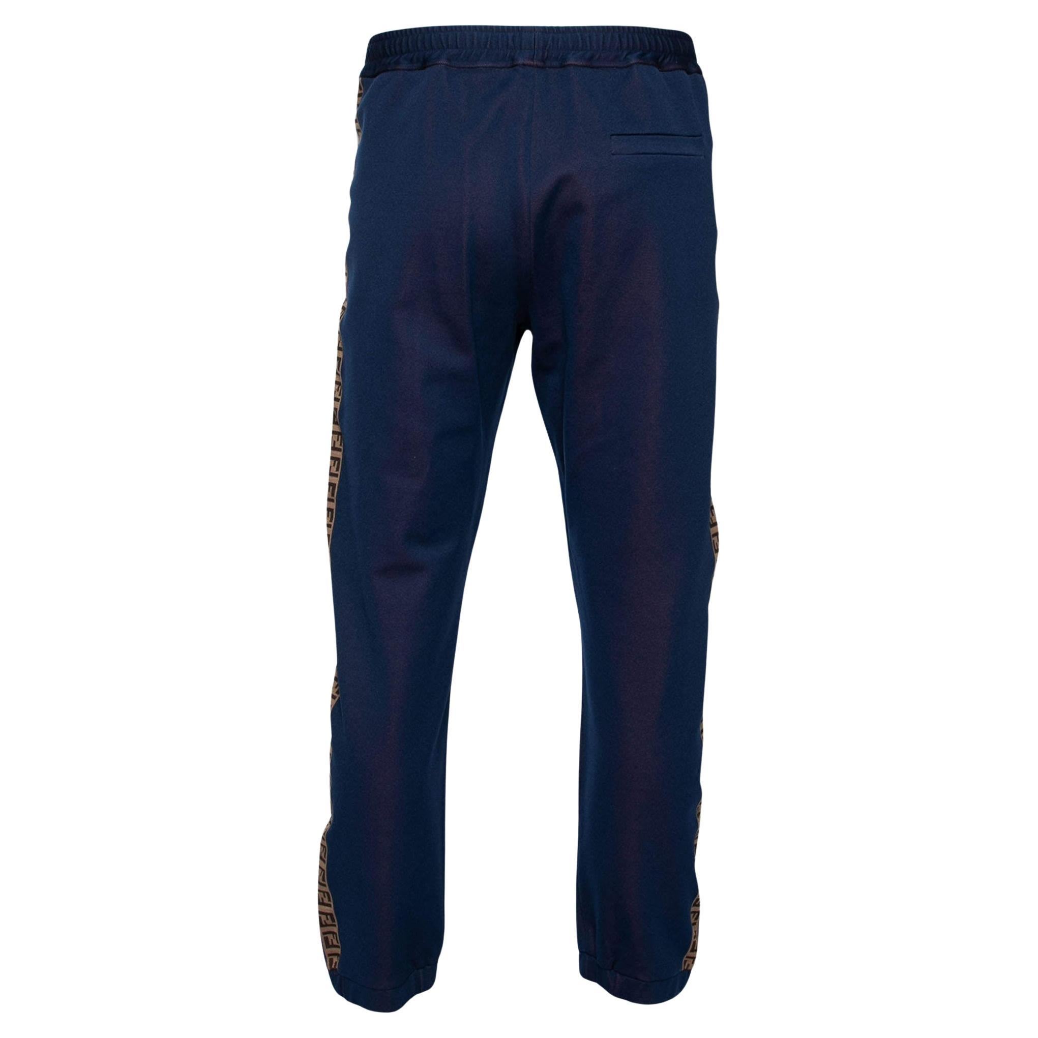 These track pants come from the Fendi x Hey Reilly collaboration and truly showcase artistic craftsmanship. They have a blue shade with logo tape trims on the sides and have been made from a cotton blend. Team them with a simple tee and sneakers.

