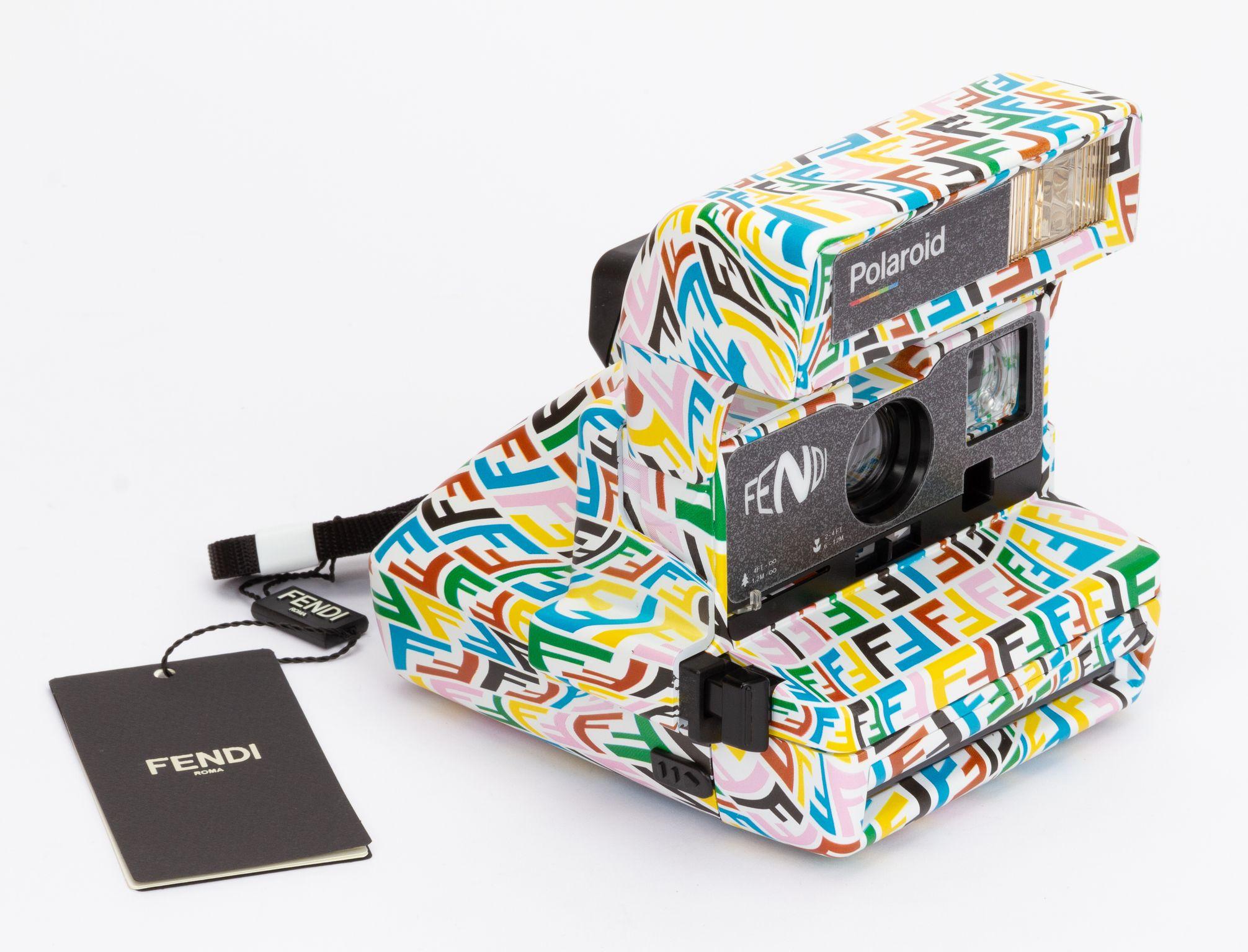 Fendi Polaroid OneStep Close-Up 600 in a “FF Vertigo Motif”. The piece is part of the collaboration between Fendi and artist Sarah Coleman. The camera comes with a shoulder strap (drop 8.5