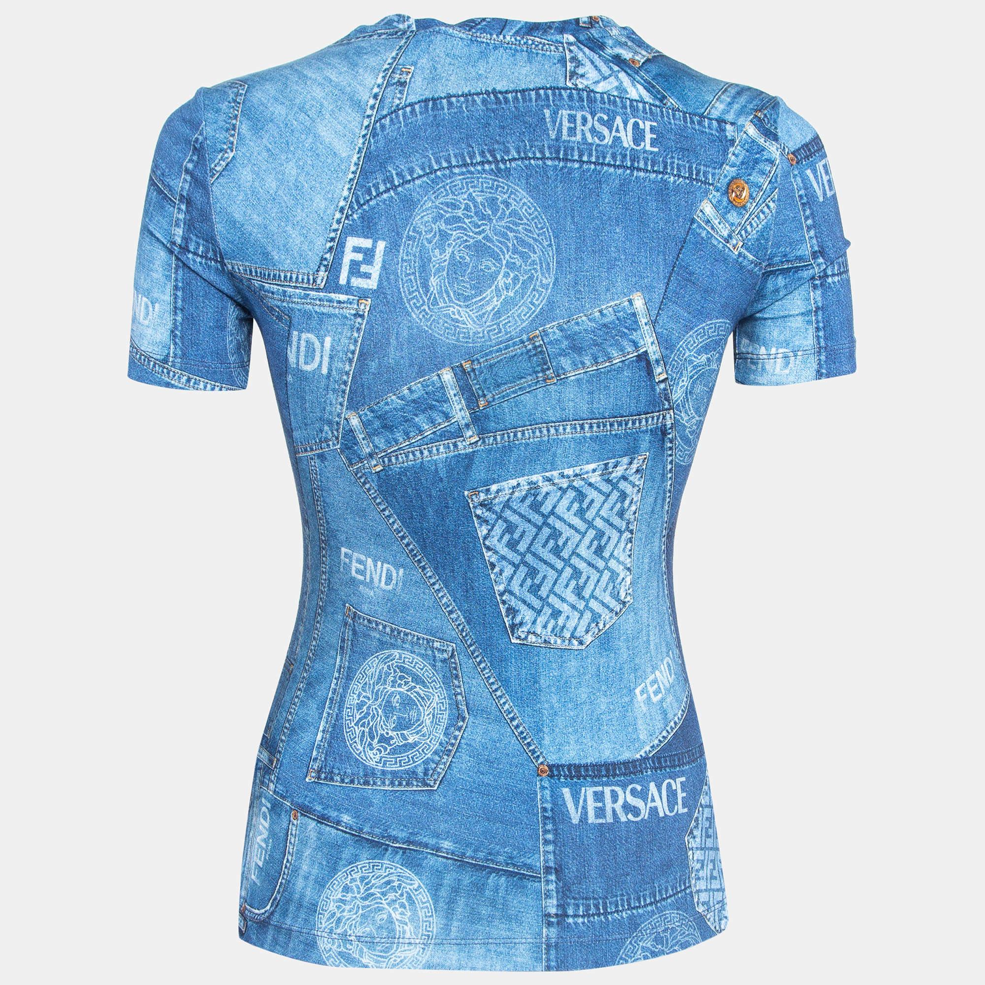 Immerse yourself in luxury with the Fendi x Versace t-shirt. Crafted with exquisite attention to detail, this opulent garment features a denim print pattern accented by sparkling crystal embellishments, effortlessly blending style and extravagance
