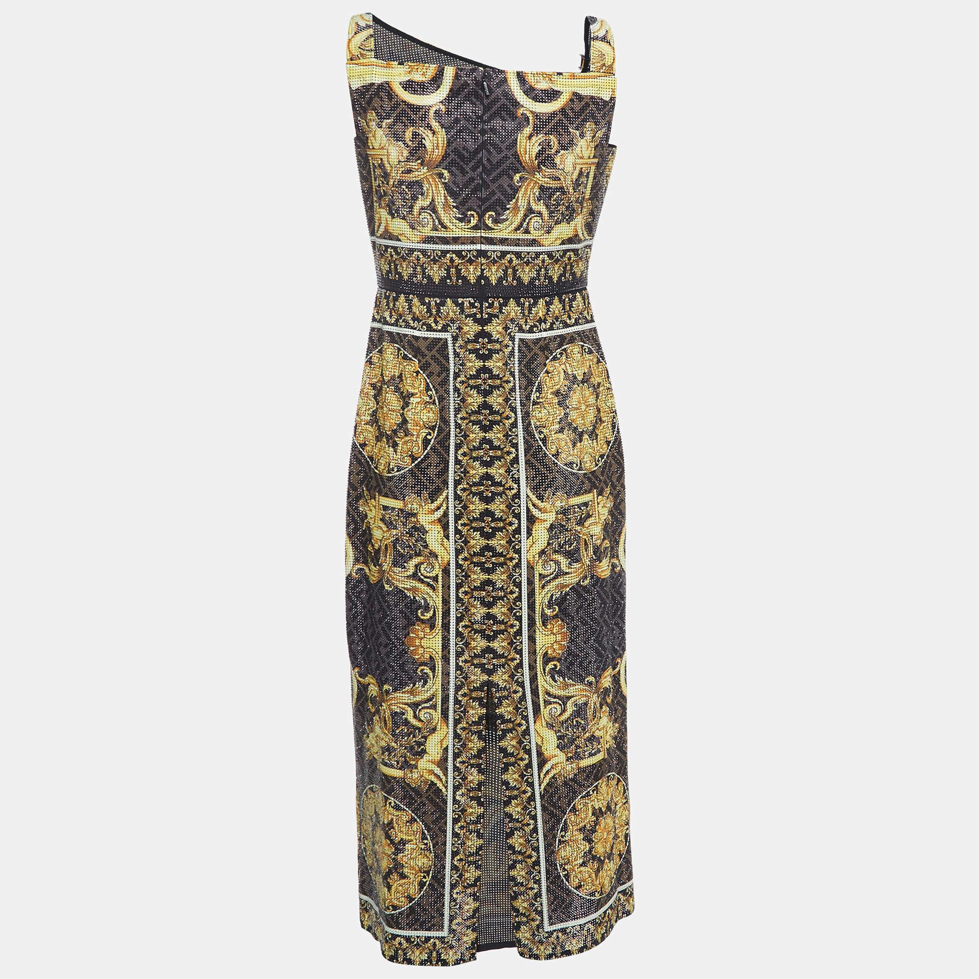 Characteristically statement-making and timelessly elegant. this dress from the Fendi X Versace collaboration presents beauty through high-quality materials and fine tailoring. It has a Zucca with Baroque detailing all over with the company of