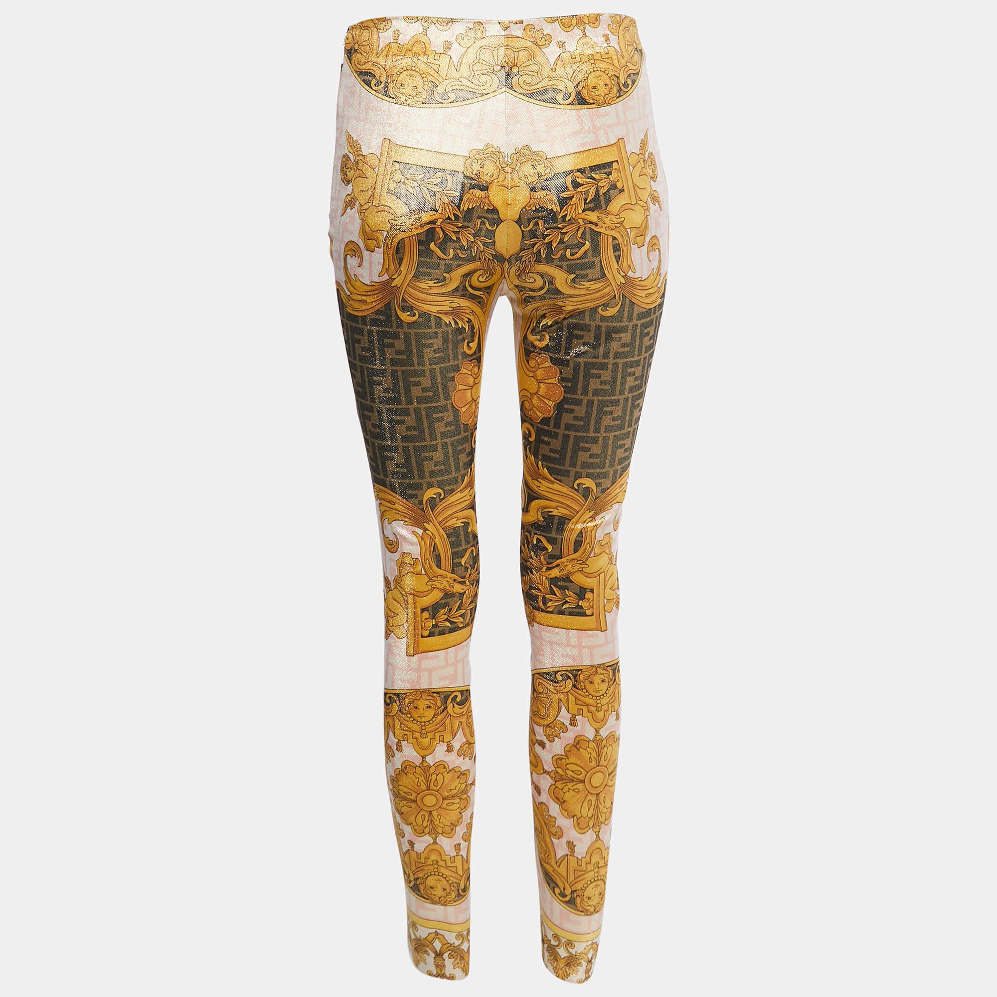 The Fendi x Versace leggings combine the best of both luxury brands, boasting a striking yellow hue and intricate patterns. Crafted from high-quality lurex knit, these leggings offer a comfortable and stylish fit, perfect for making a bold fashion