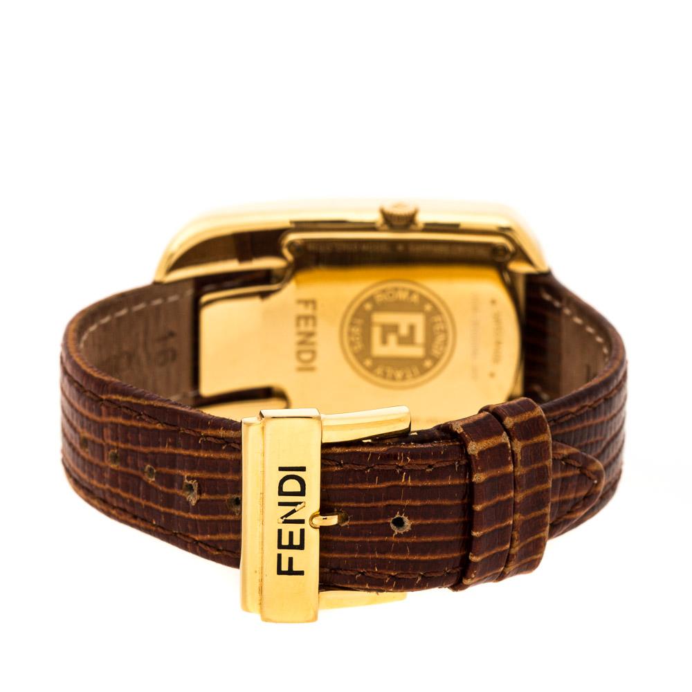 Fendi’s Chameleon watch is a stunner! This show-stopper style comes with a yellow polished dial set in a gold-plated steel case and a unique bezel with Fendi’s logo seamlessly infused into it. The dial has two diamond-studded hour markers at the 12