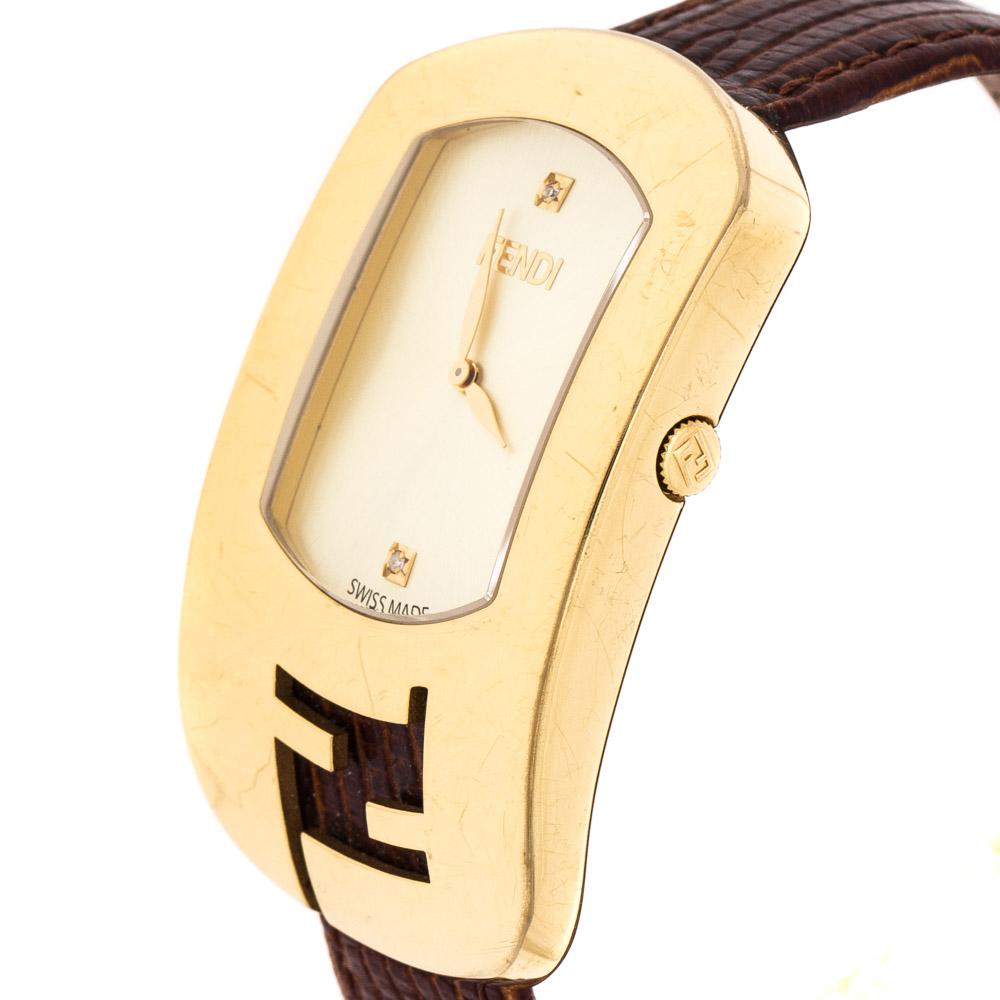 Fendi’s Chameleon watch is a stunner! This show-stopper style comes with a yellow polished dial set in a gold-plated steel case and a unique bezel with Fendi’s logo seamlessly infused into it. The dial has two diamond-studded hour markers at the 12