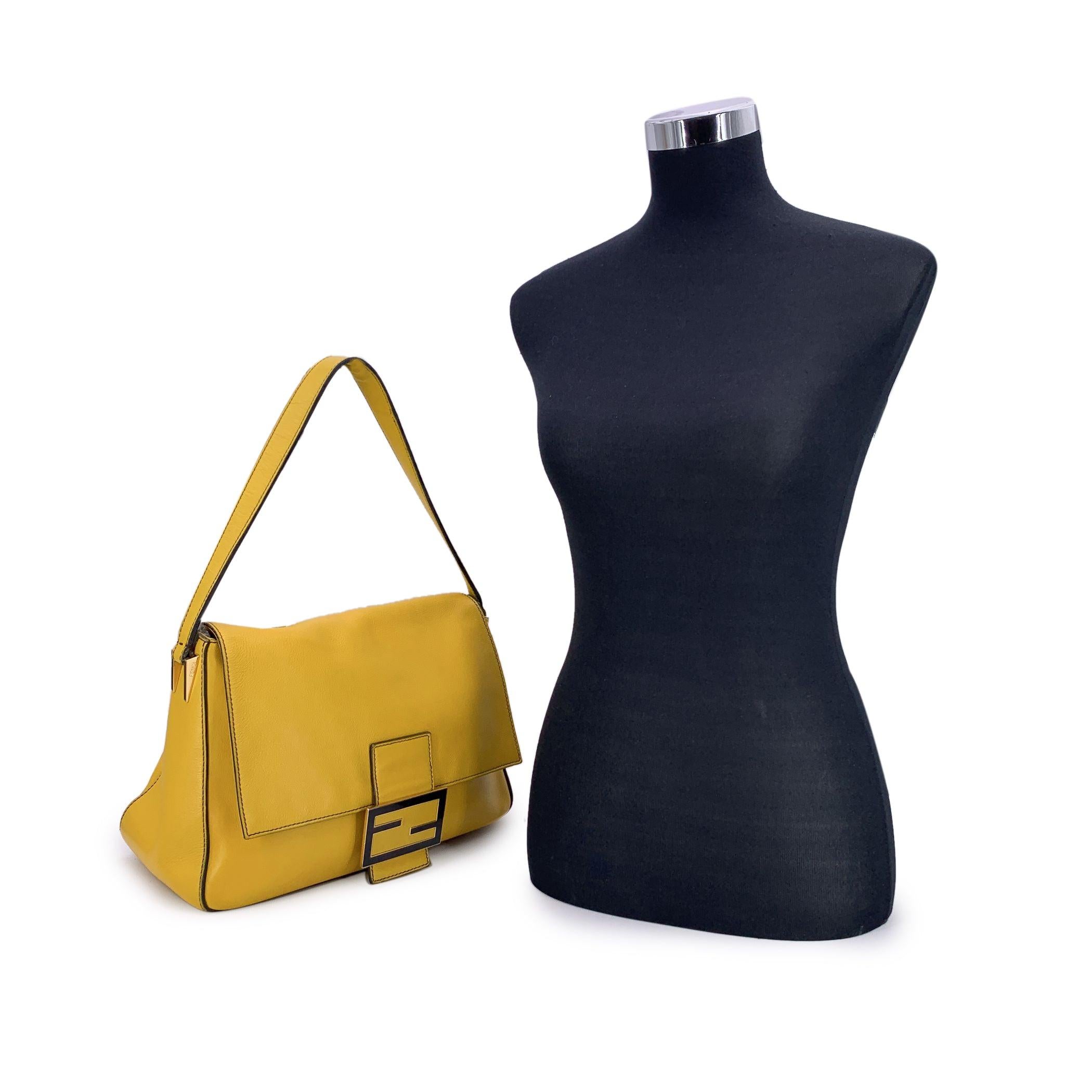 Introducing the Fendi Yellow Leather Big Mamma Forever Flap Bag, a statement piece that's both chic and practical for everyday wear. Crafted from supple yellow leather, this bag radiates warmth and style with a vibrant pop of color. The strap adds