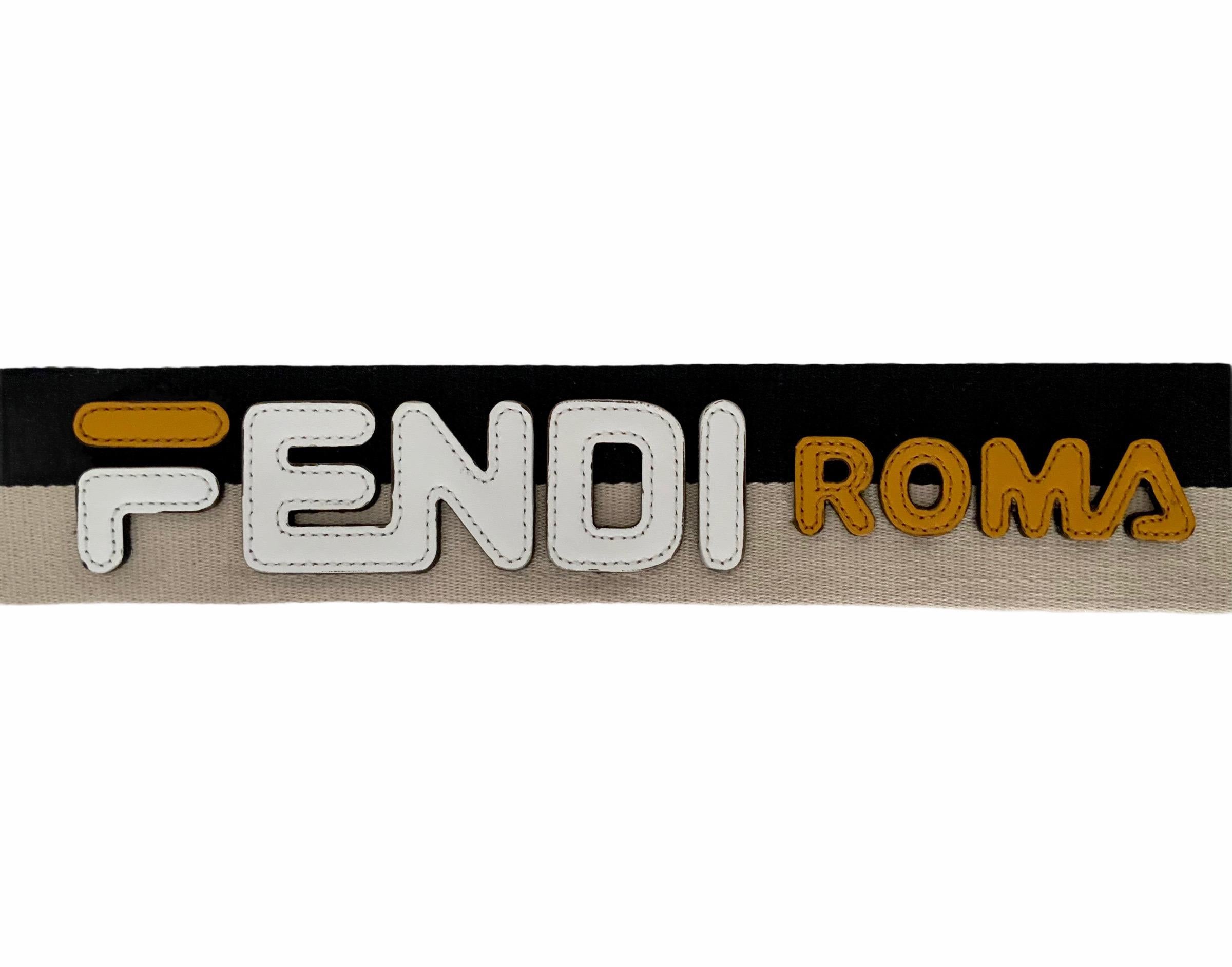 This pre-owned but new canvas strap from Fendi features a leather logo detail and goldtone double spring clips.
It can be used for a variety of handbags.

Collection: Strap You
Material: canvas, leather
Color: beige, black
Hardware: gold-tone