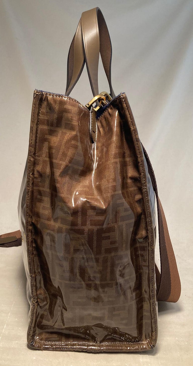 Fendi Zucca Mania Large Shopper Tote in excellent condition. Created in collaboration with Fendi, coated zucca monogram canvas exterior with white and yellow leather embroidered Fendi Roma along front side. Brown leather top handles and removable