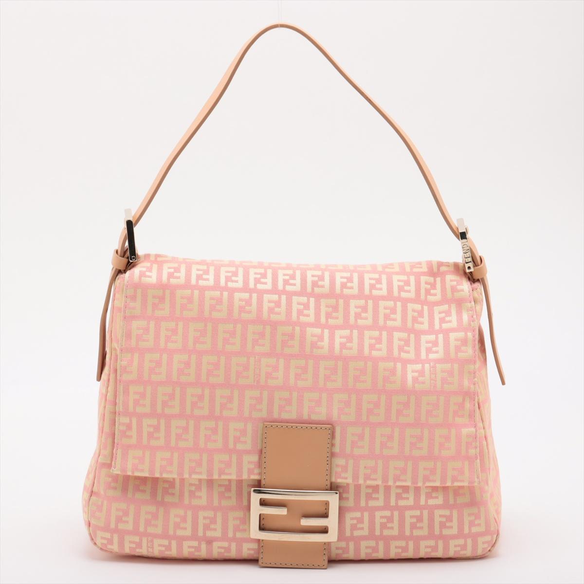 The Fendi Zucchino Mamma Forever Canvas Baguette Bag in Pink is a chic and feminine accessory that perfectly combines classic Fendi style with a playful touch. Crafted from durable canvas, it features the iconic Zucchino monogram pattern in soft