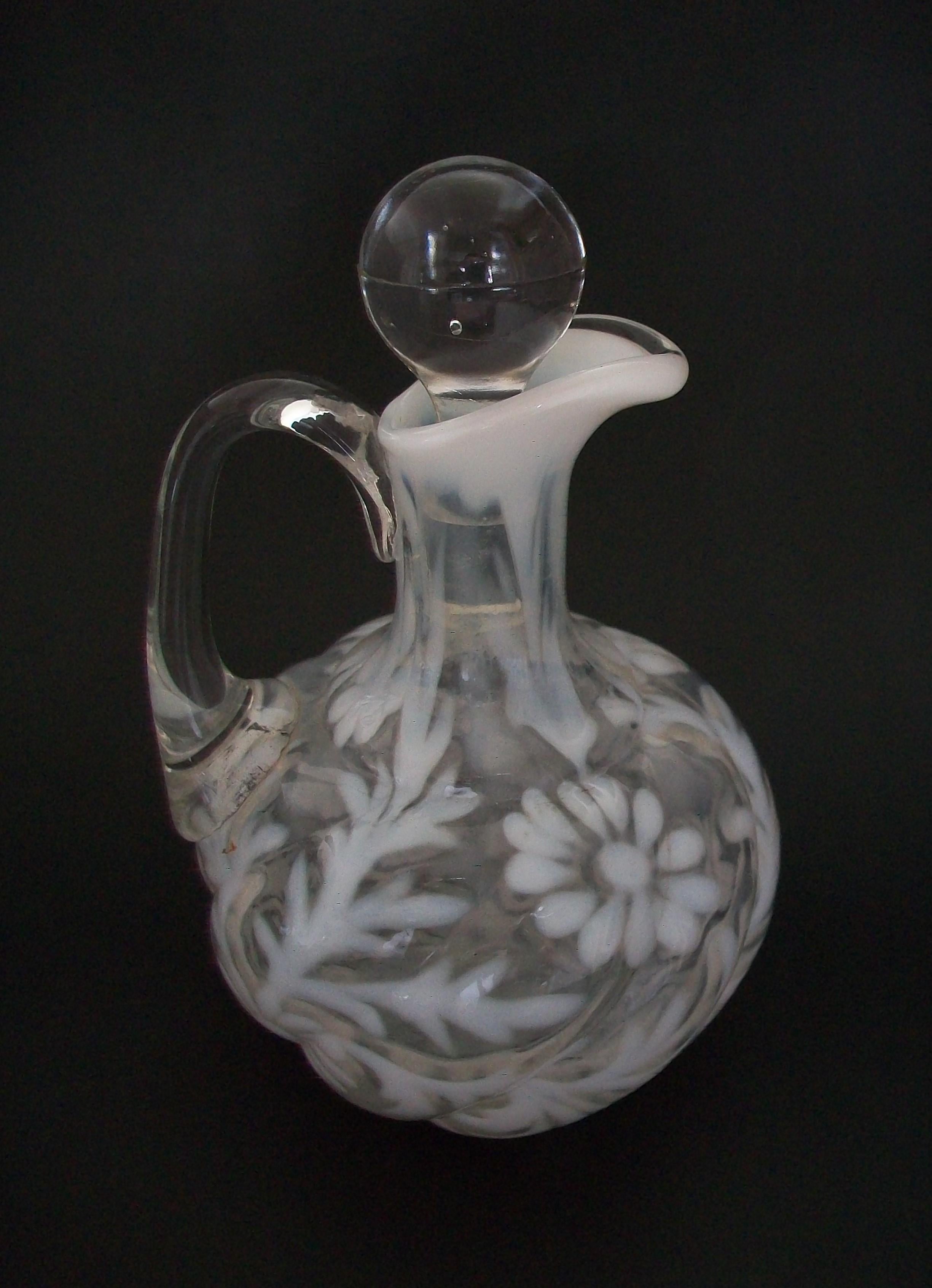 FENTON - 'Daisy & Fern' - Antique opalescent and clear glass cruet - mold blown body - hand made clear pulled glass handle - clear molded stopper (appears to be original - tight fitting) - unsigned - United States - circa 1890.

Excellent antique