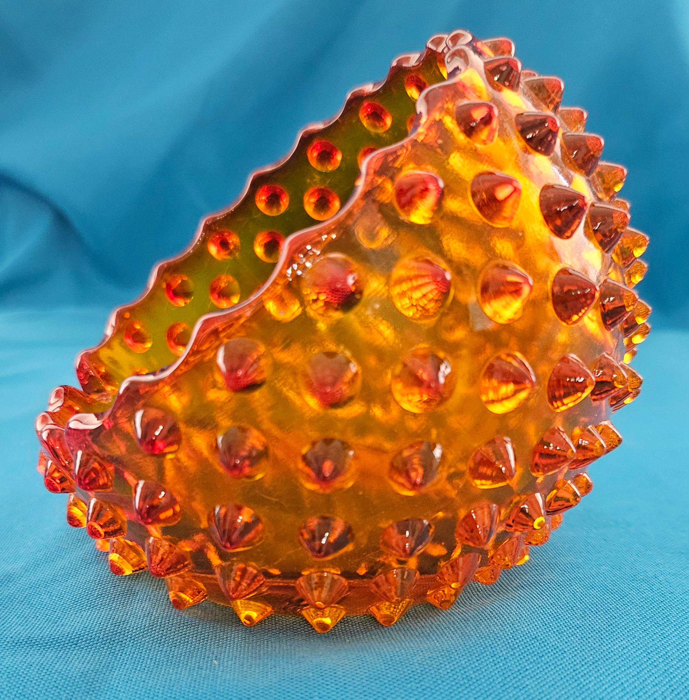 Fenton Golden-Amber Hobnail Orb, Ball-Shaped Ashtray / Vessel
UPDATE: Due to agreement with 1stDibs, we'll be staying through the end of the year.
This pretty hobnail piece, originally designed to be an ashtray, is actually a versatile mid-century