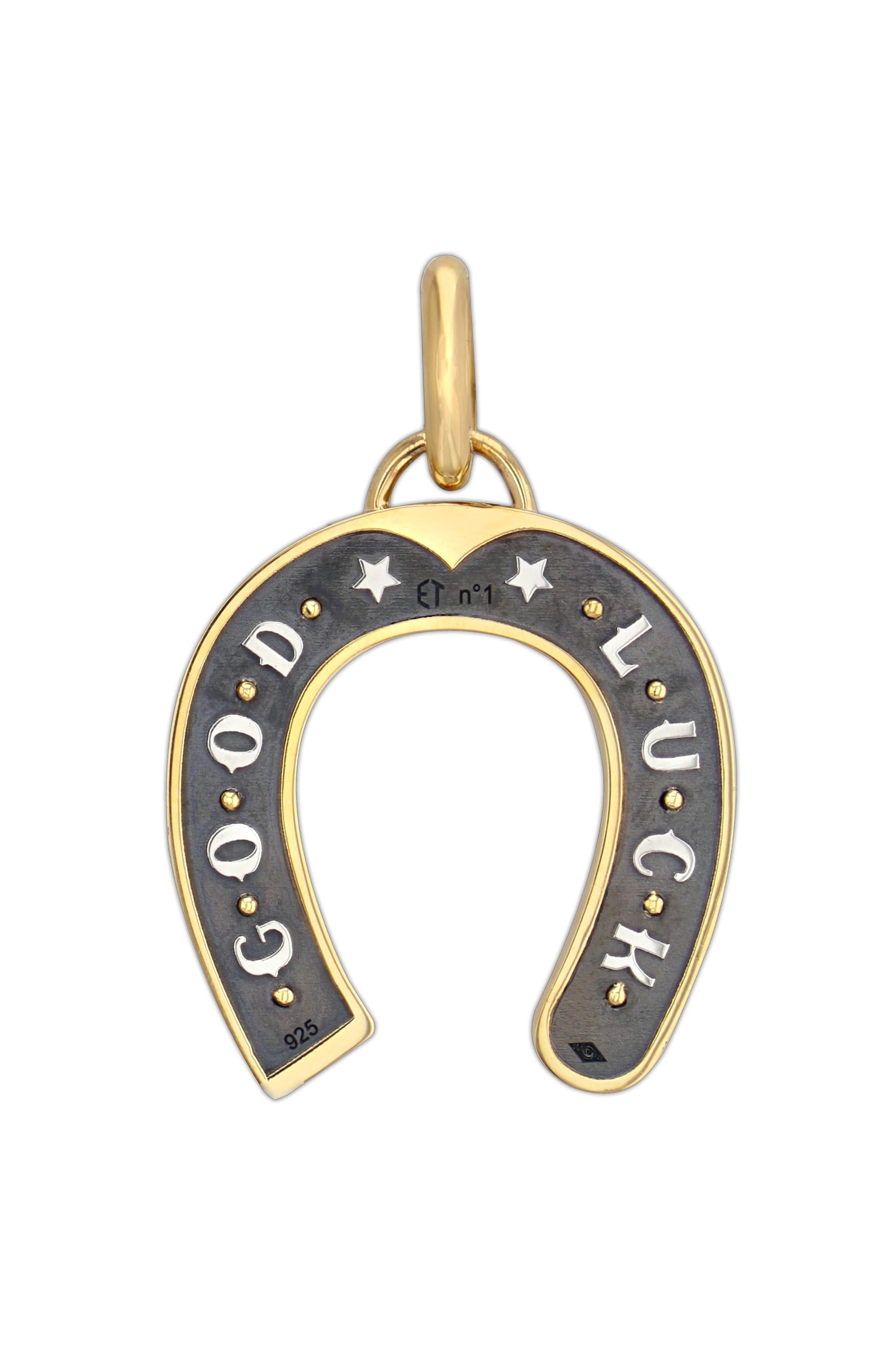 Yellow gold and distressed silver charm studded with diamonds. Openable gold bail.

Sold without the chain. 

Available with chain on request.

Details:
Diamonds : 0.4 cts          
18k Yellow Gold : 7.3 g     
Distressed Silver : 3.2 g        
Made